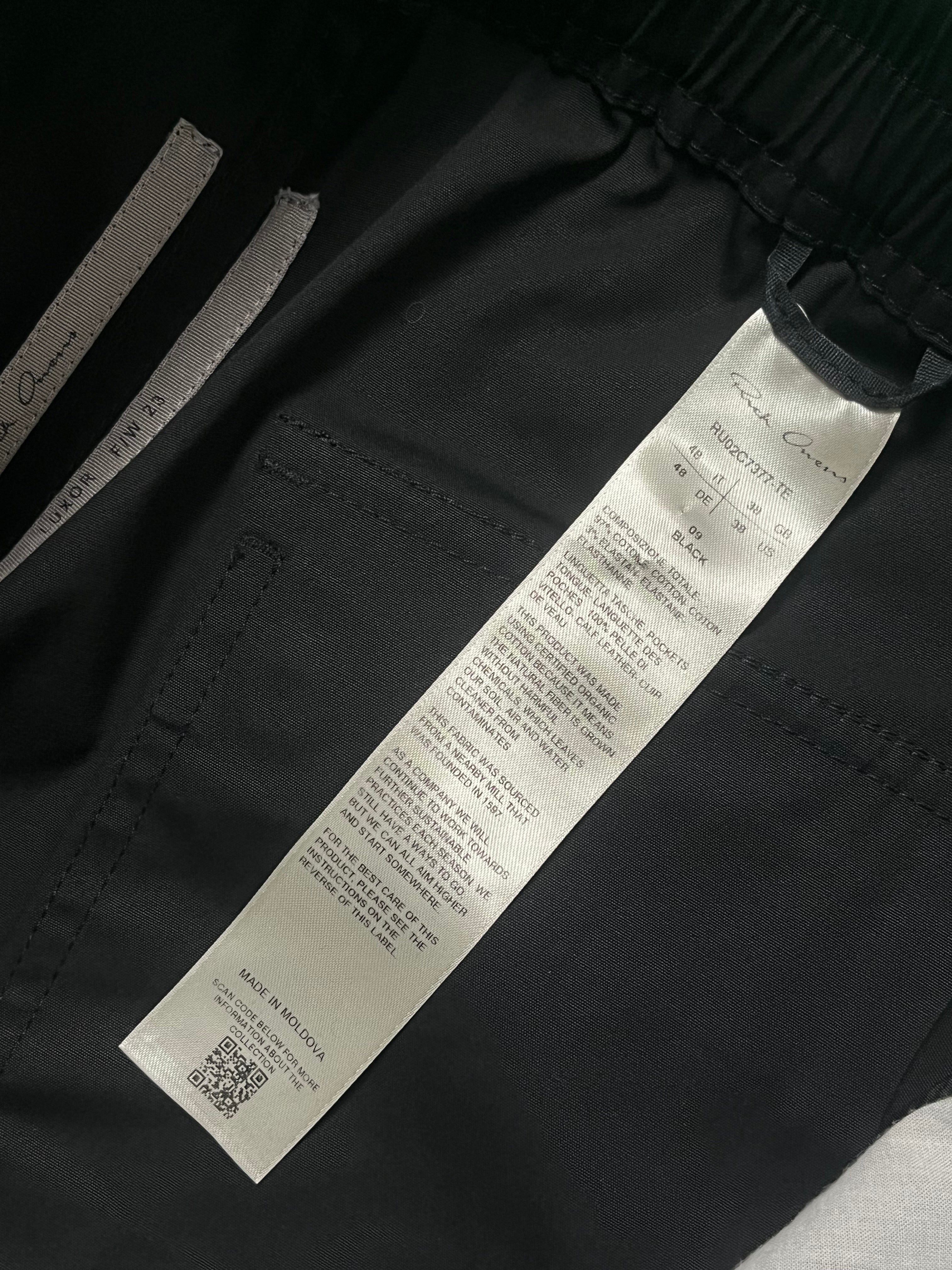 Rick Owens FW23 Luxor Bauhaus cargo jogger pants with tapered fit, featuring multiple pockets and a modern, streetwear-inspired design.