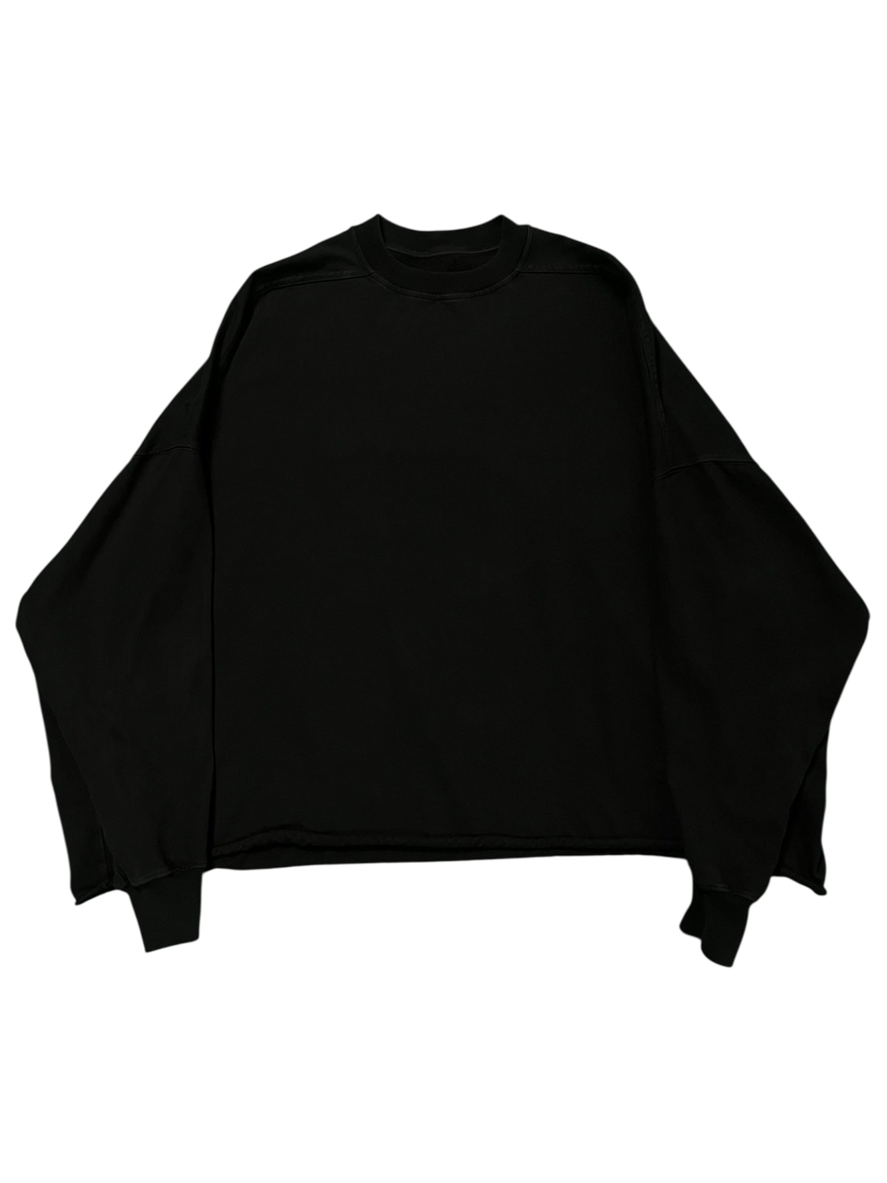 Rick Owens DRKSHDW oversized crewneck in black, featuring a relaxed fit and soft fabric, displayed on a hanger.