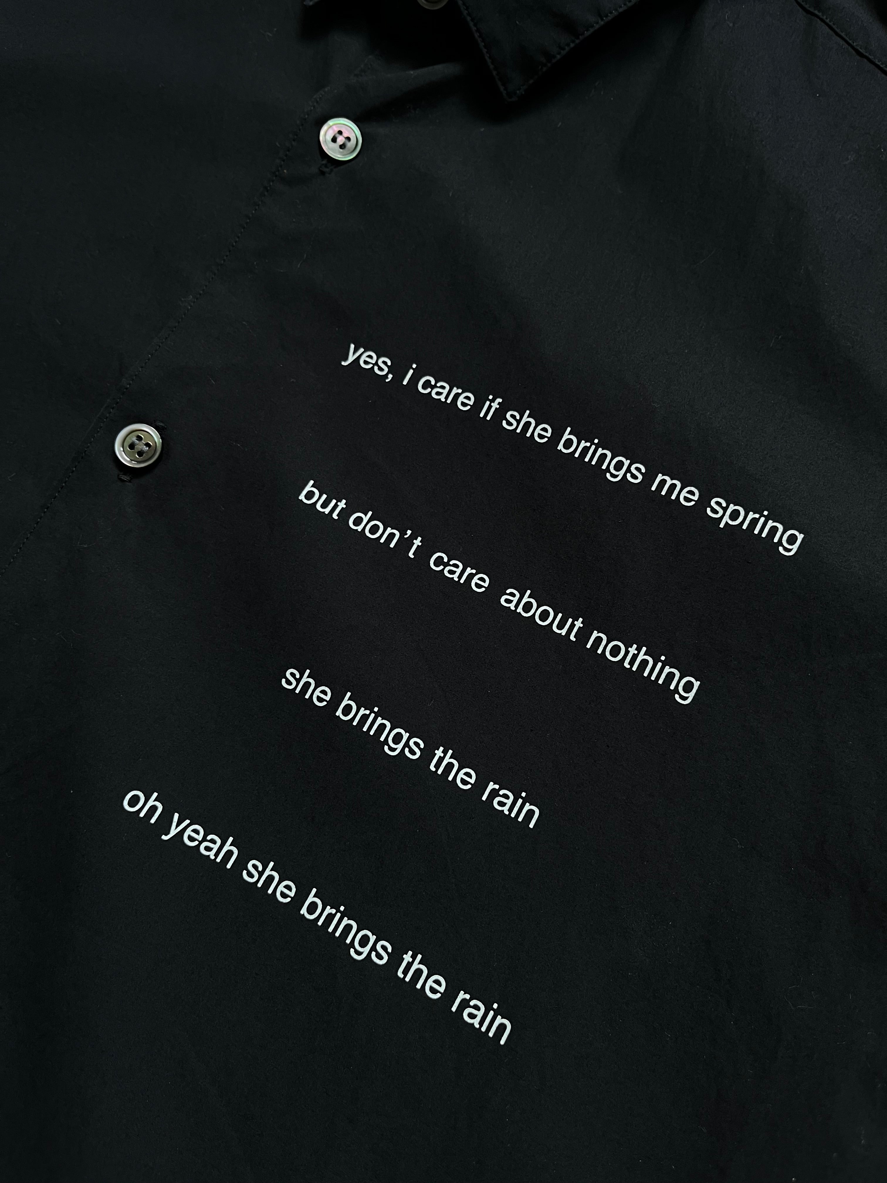Undercover SS12 "Openstrings" She Brings The Rain shirt, stylish women's shirt with open string details and rain-inspired design.