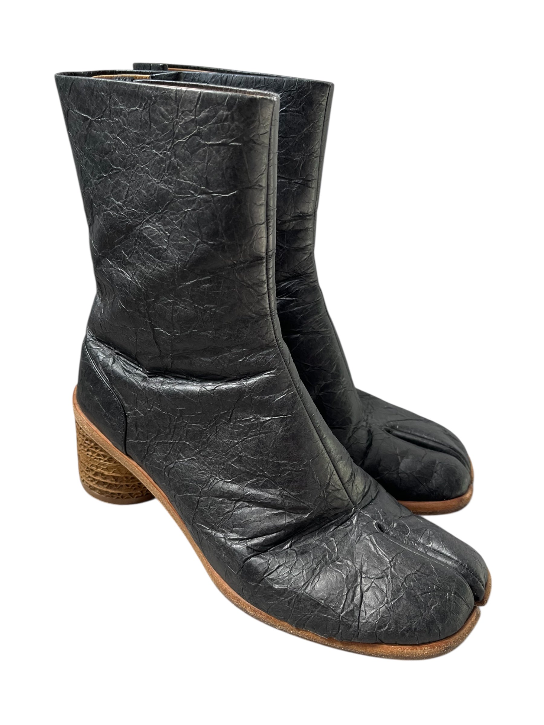 Maison Margiela SS22 crinkled paper effect leather tabi boots with unique textured surface and split toe design.