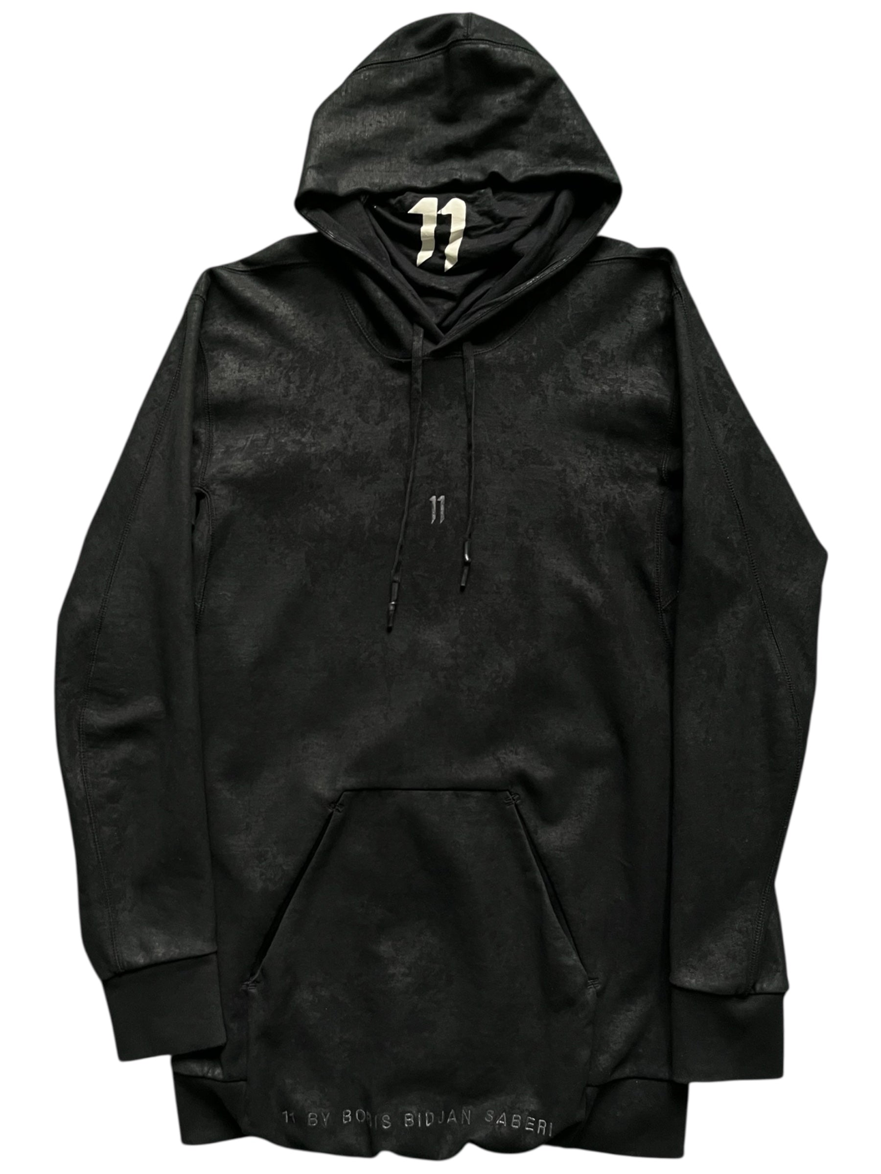 Boris Bidjan Saberi Ninja Hoodie featuring a sleek black design with modern streetwear style and detailed fabric texture.