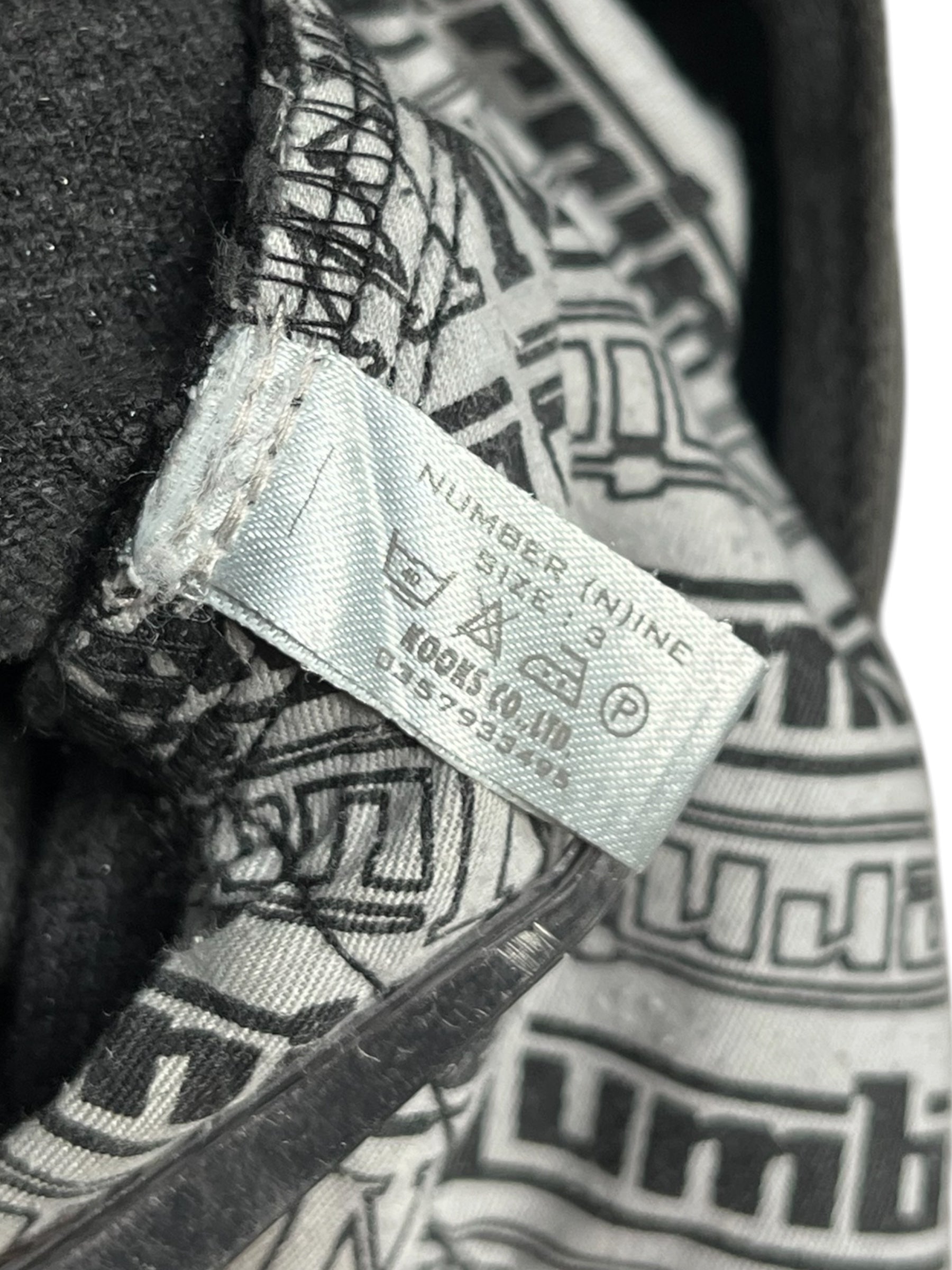 Number (N)ine AW01 "Standards" grey faded denim pants with a relaxed fit and classic five-pocket design.