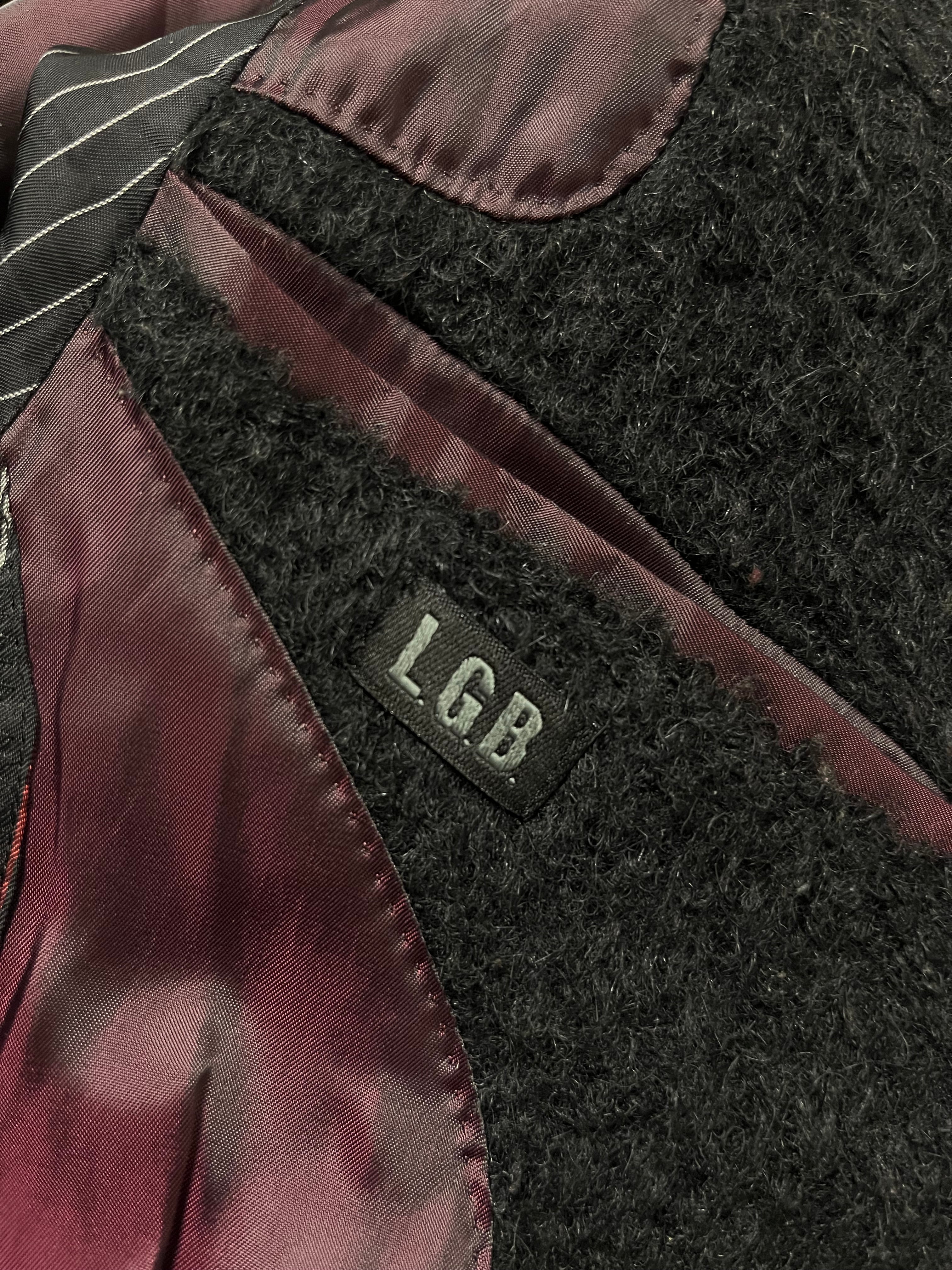 Le Grande Bleu black trench coat with back cross design, stylish 00s-inspired coat, featuring classic trench details.