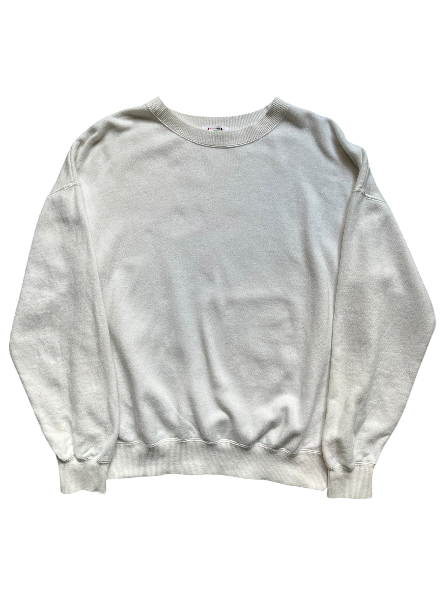Issey Miyake Tsumori Chisato 80s-inspired crewneck sweater with vibrant patterns and comfortable knit fabric.