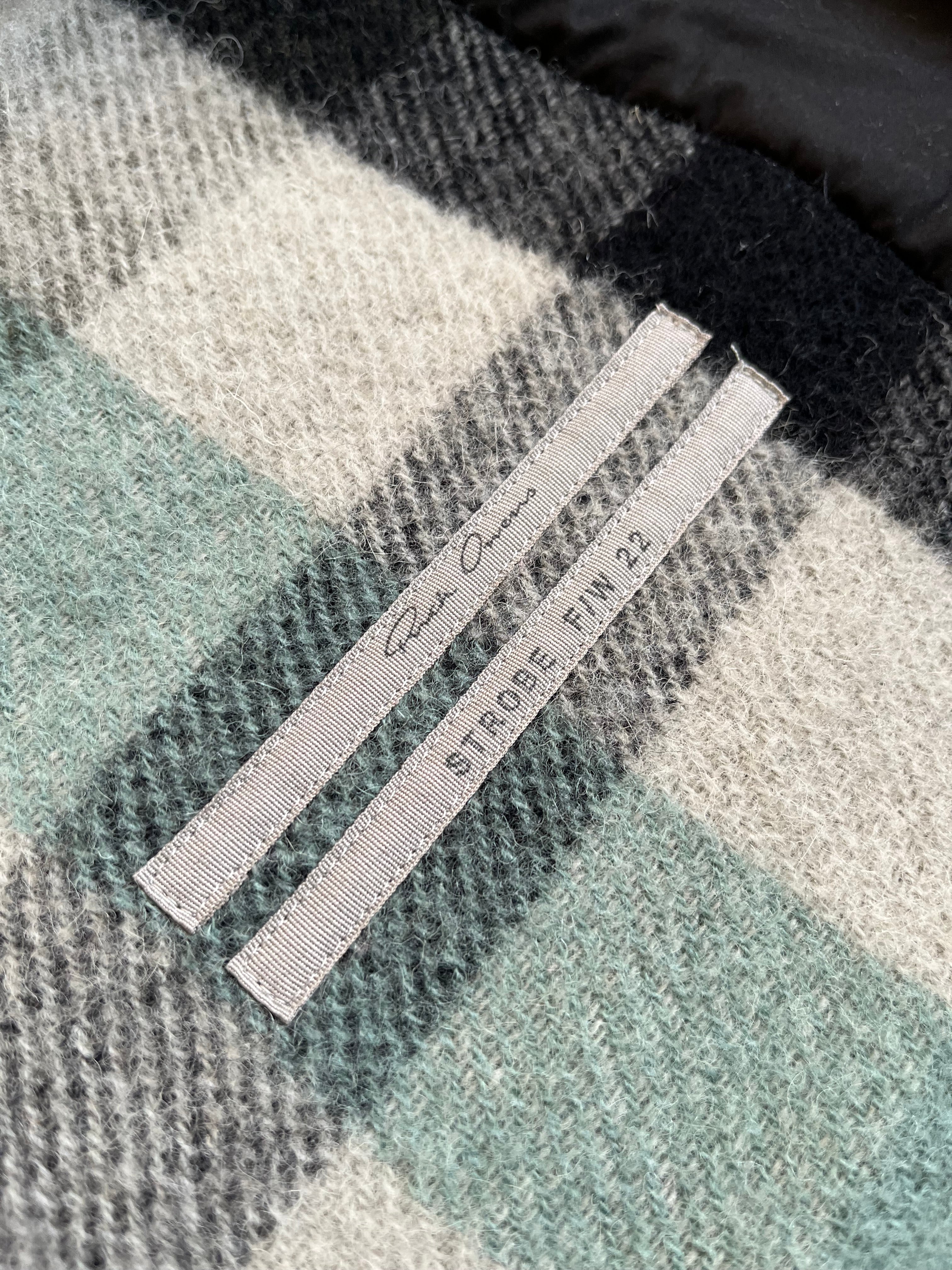 Rick Owens FW22 Strobe Pearl Plaid Alpaca Overshirt jacket with plaid pattern, plush alpaca texture, and stylish oversized fit.