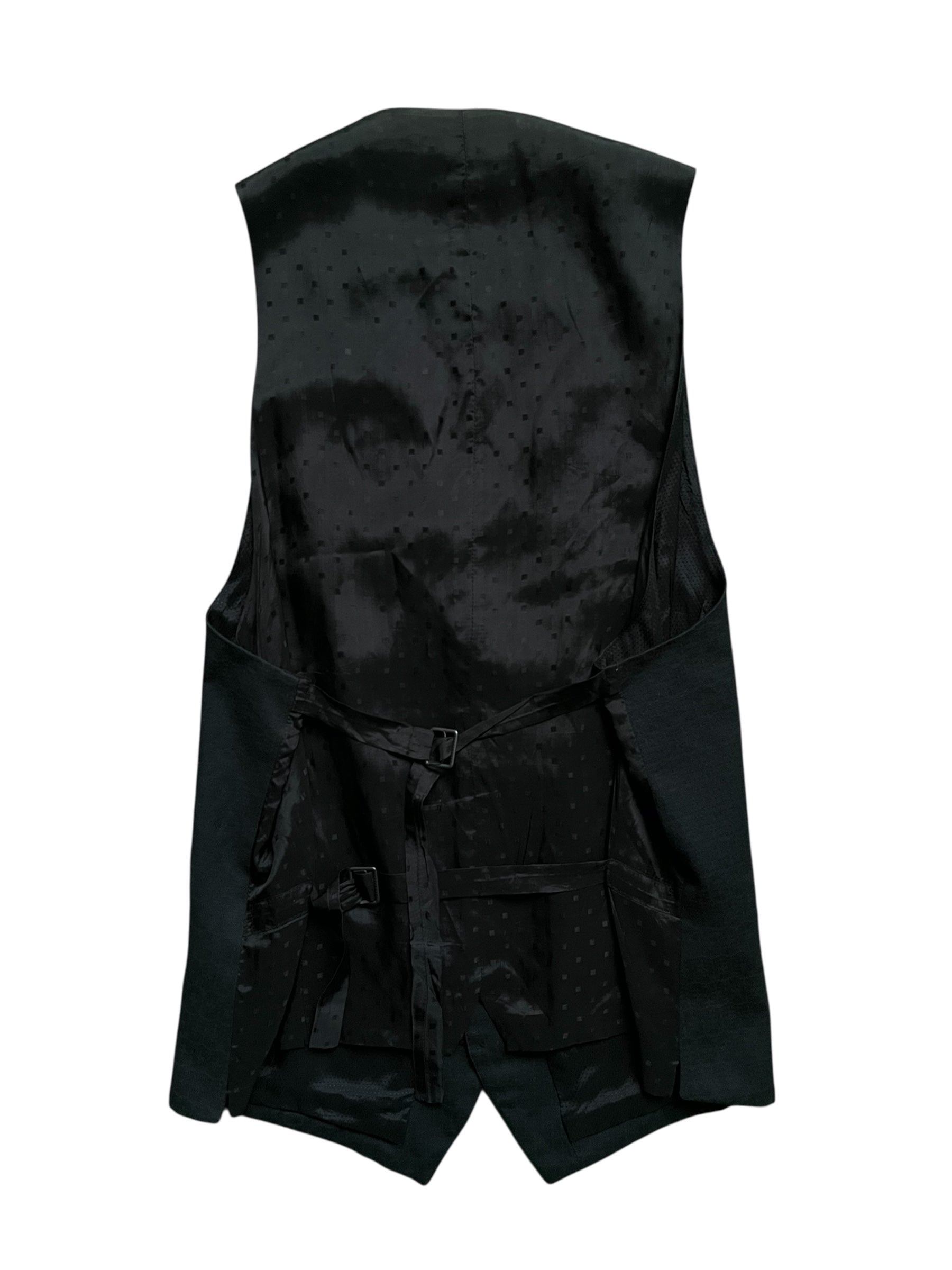 Navy wool vest by Ann Demeulemeester, featuring a fitted design with a V-neck and textured fabric.