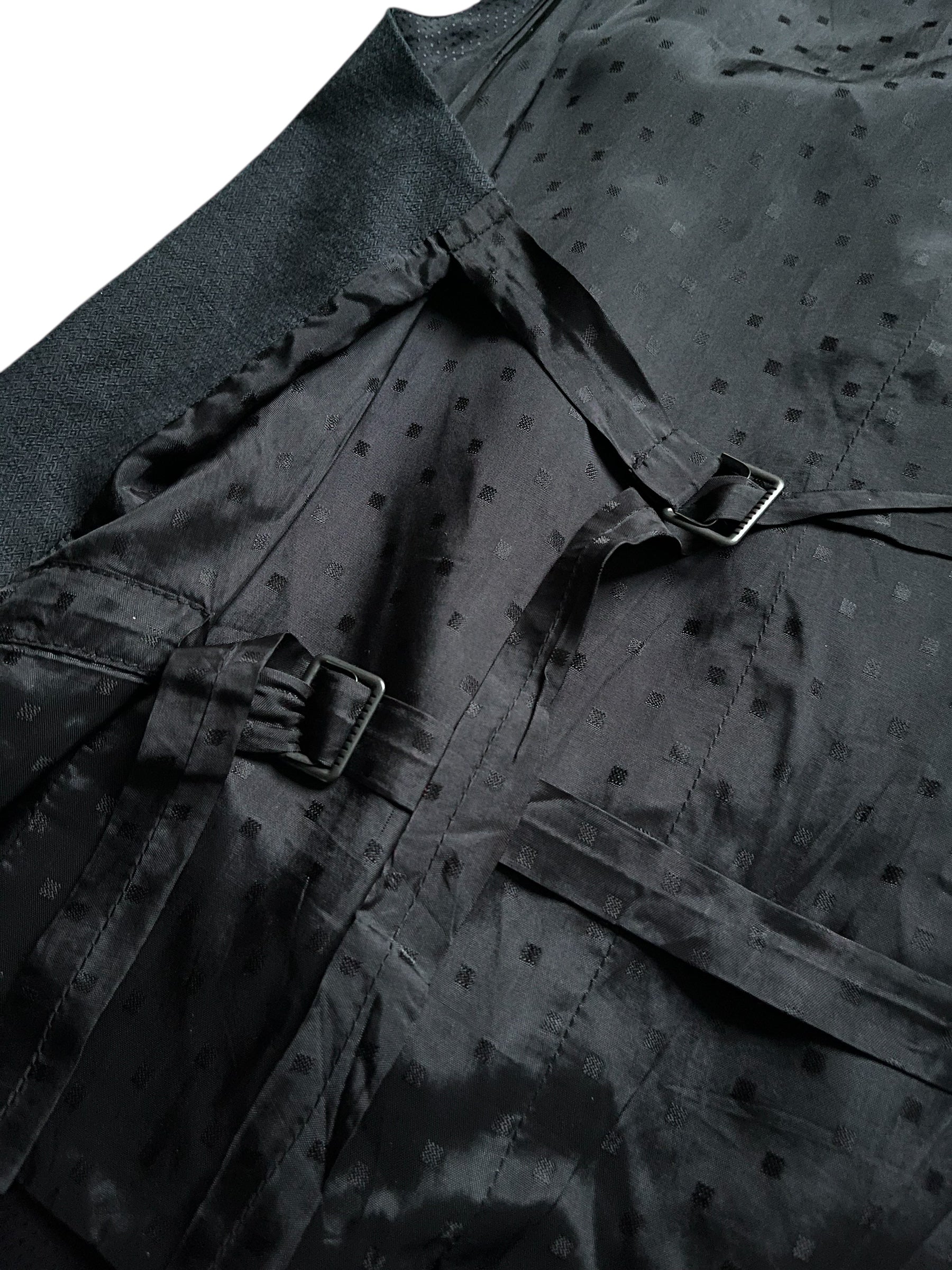 Navy wool vest by Ann Demeulemeester, tailored fit with smooth texture, front buttons, and classic sleeveless design.