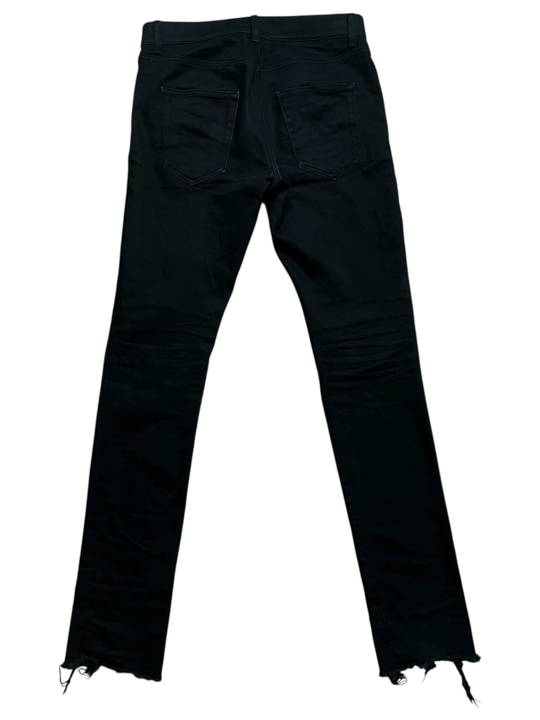 Saint Laurent SS17 D02 waxed cut denim pants showing slim fit style with distressed detailing and classic five-pocket design.