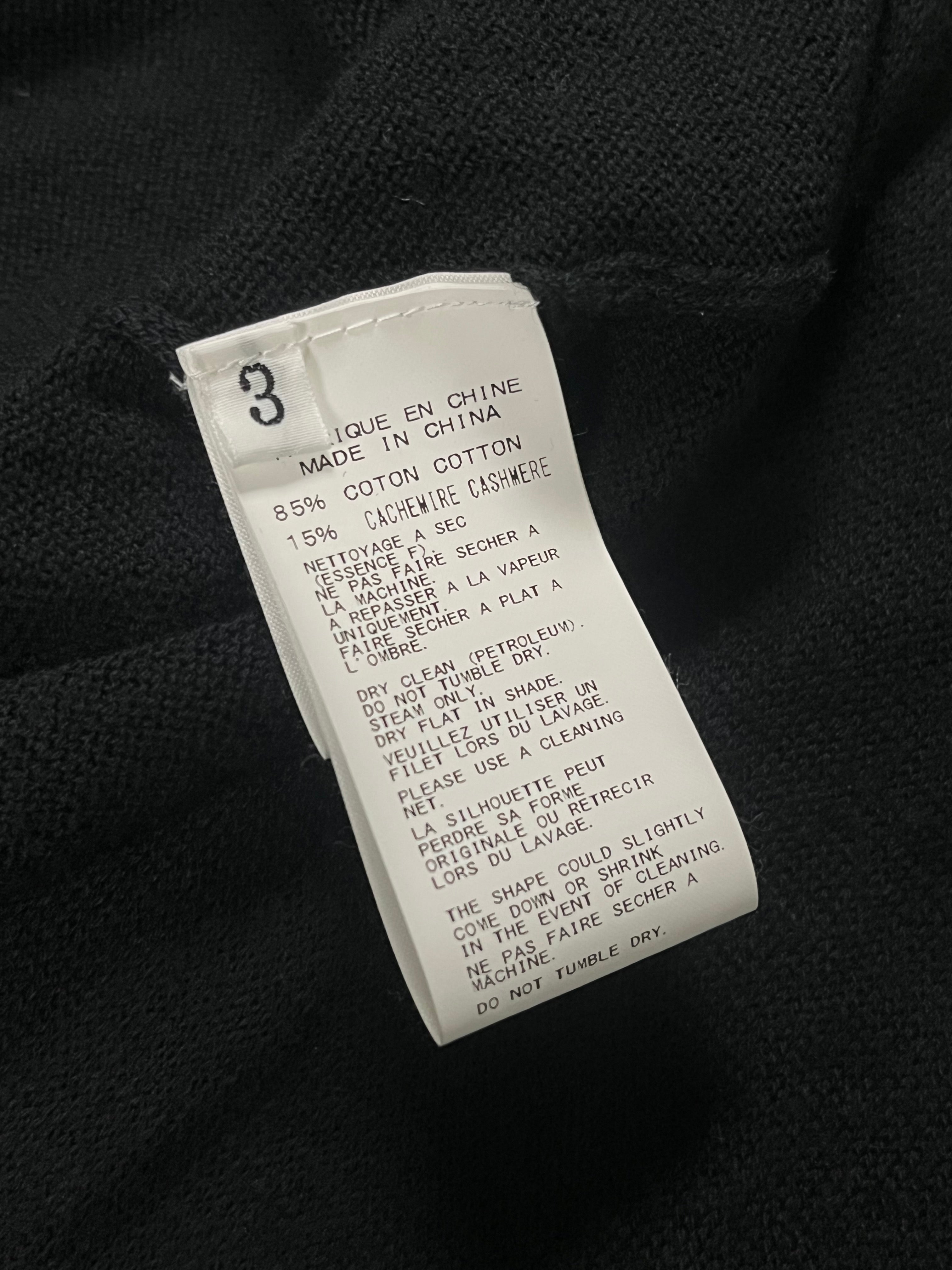 Yohji Yamamoto AW03 raglan knit long sleeve sweater in dark fabric, featuring a relaxed fit and stylish design.
