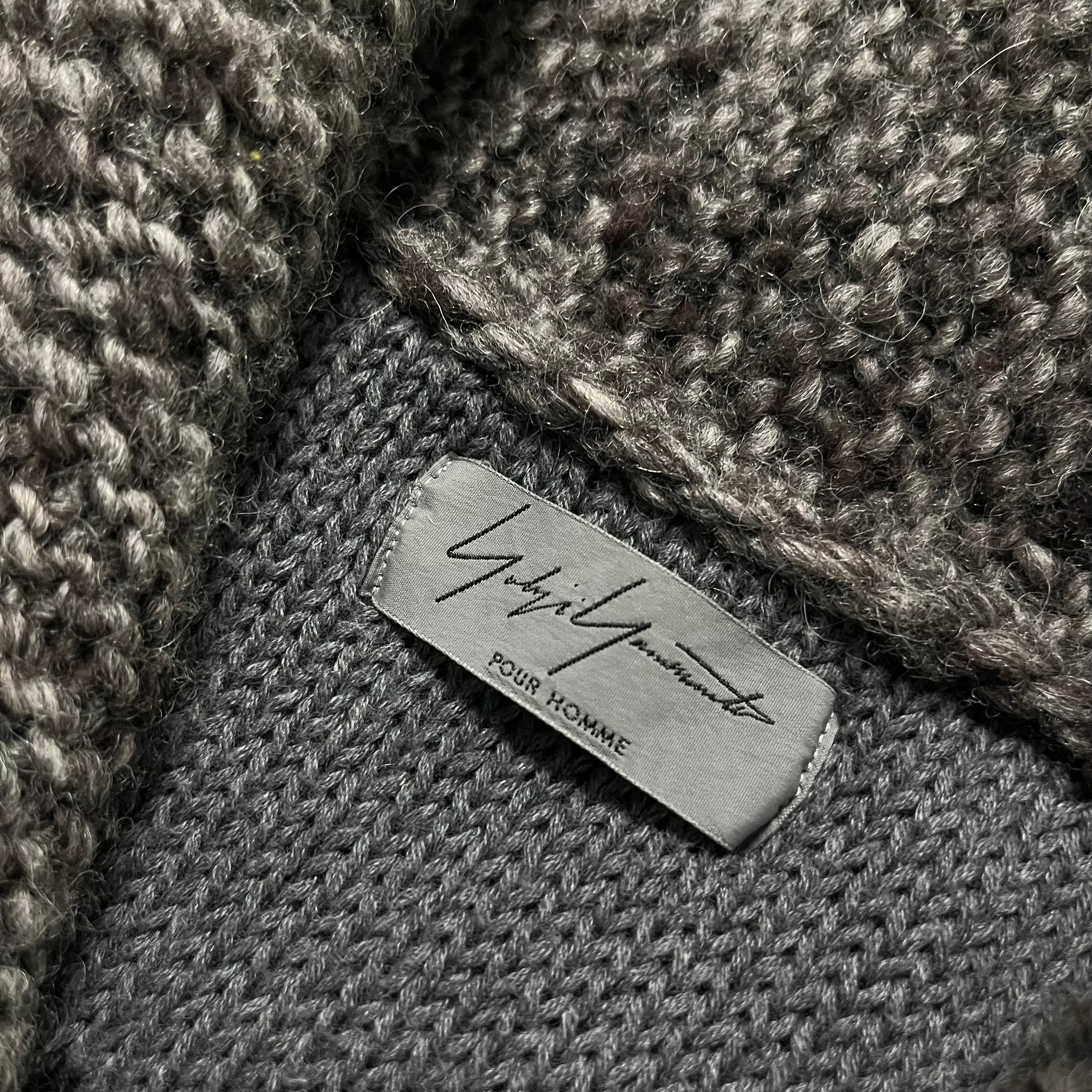 Yohji Yamamoto AW10 Cowichan Knit jacket featuring a cozy, textured knit fabric in earthy tones, displayed on a mannequin.