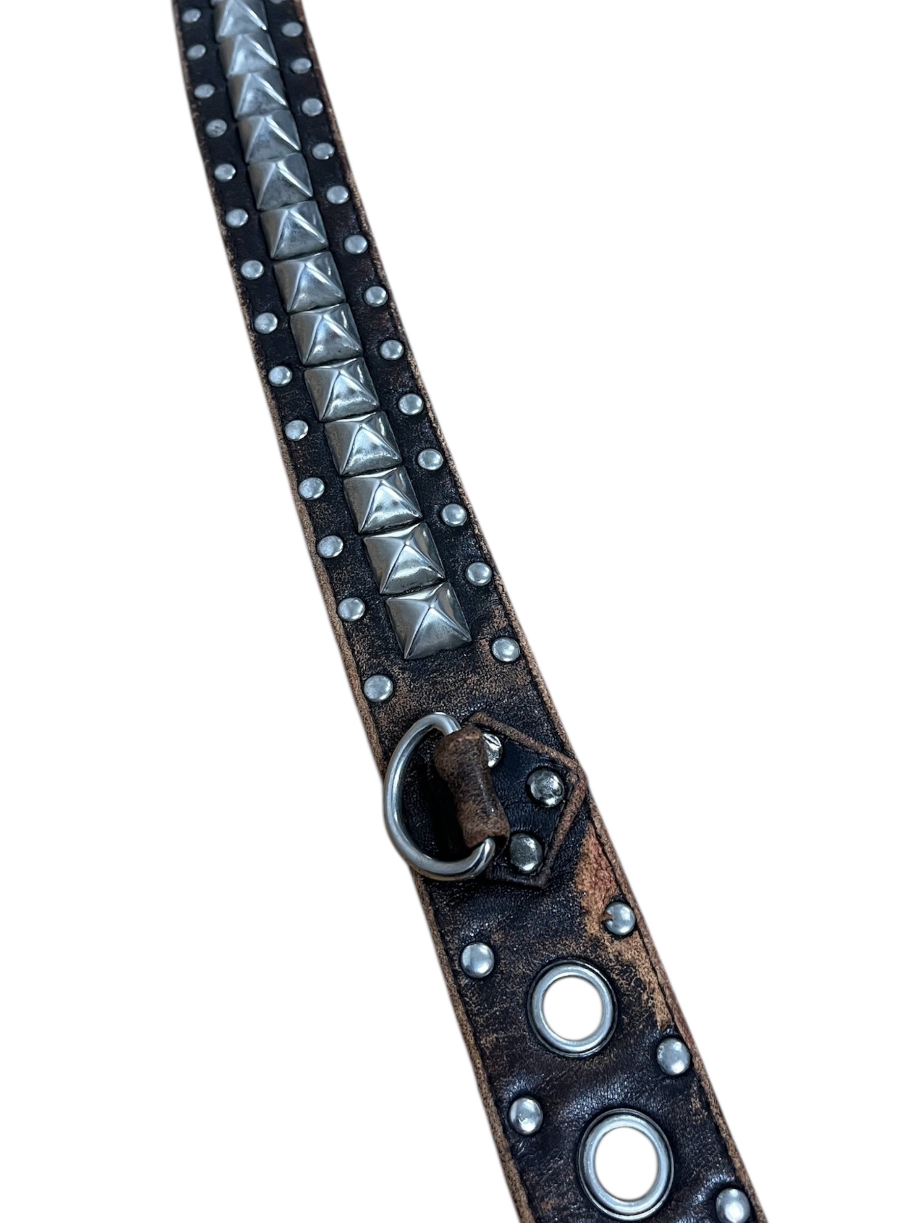 KMRii 00s studded belt with metallic studs, black leather strap, and adjustable buckle for a fashionable vintage-inspired accessory.