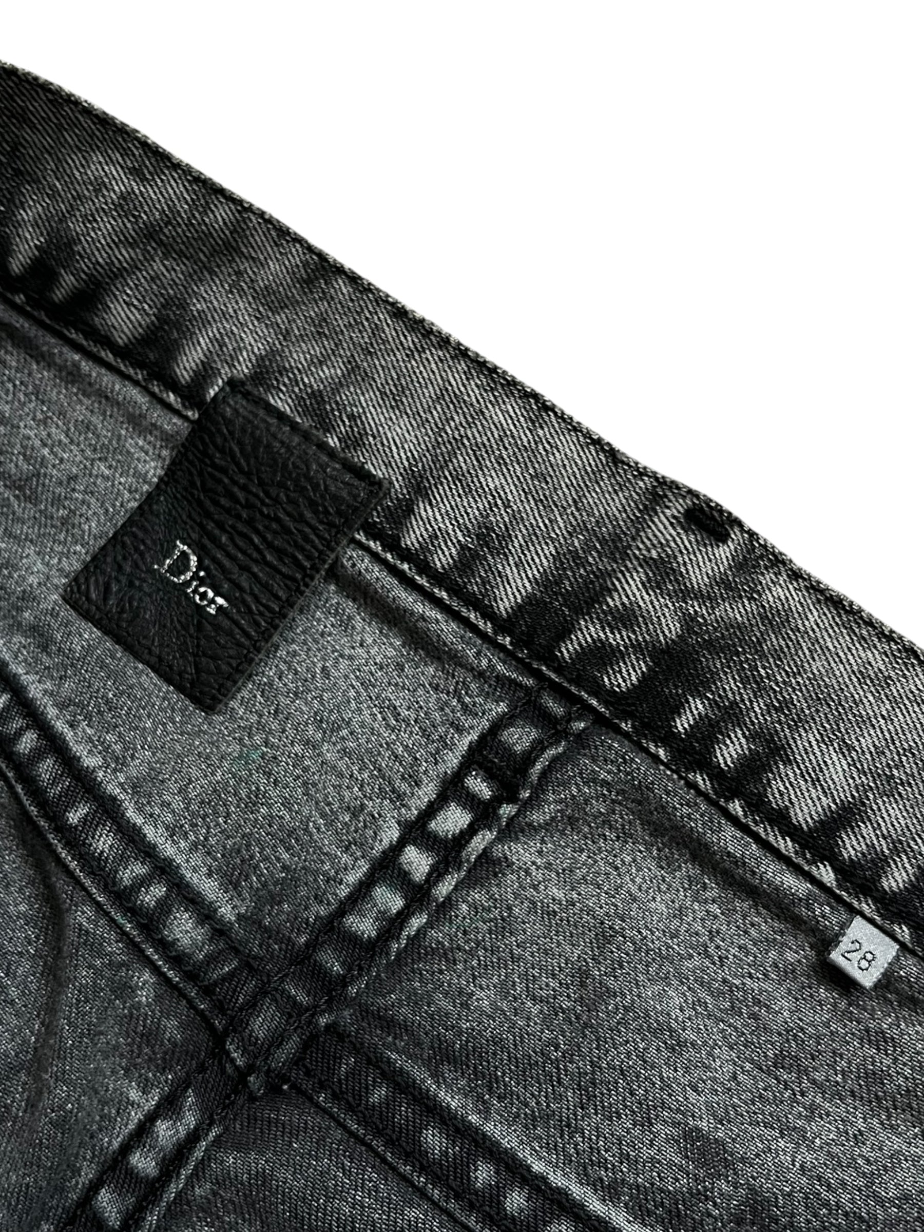 Dior SS15 acid wash slim fit denim pants with distressed details and classic five-pocket design.