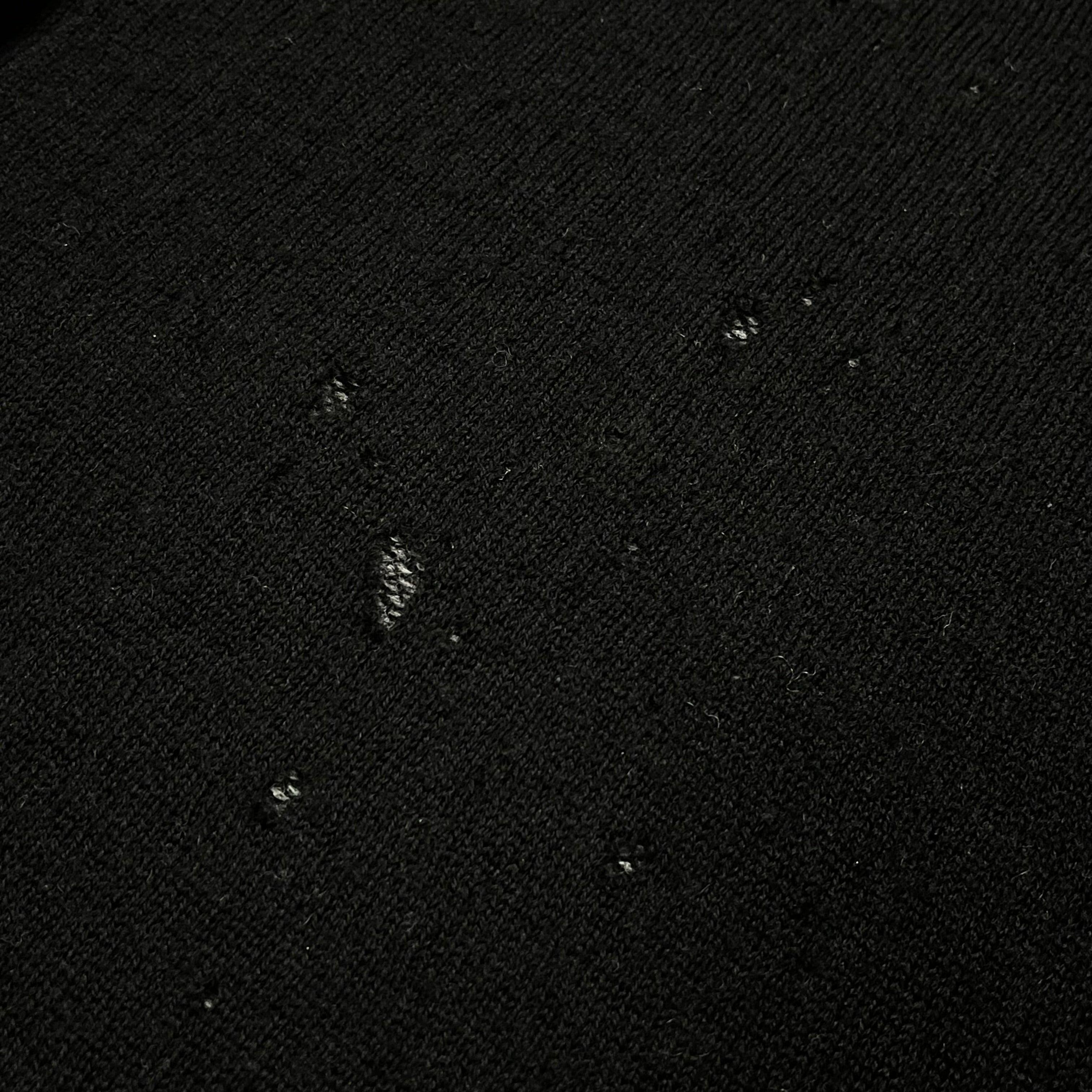 Yohji Yamamoto AW15 distressed wool knit sweater with a textured, worn-in appearance and casual, oversized fit.