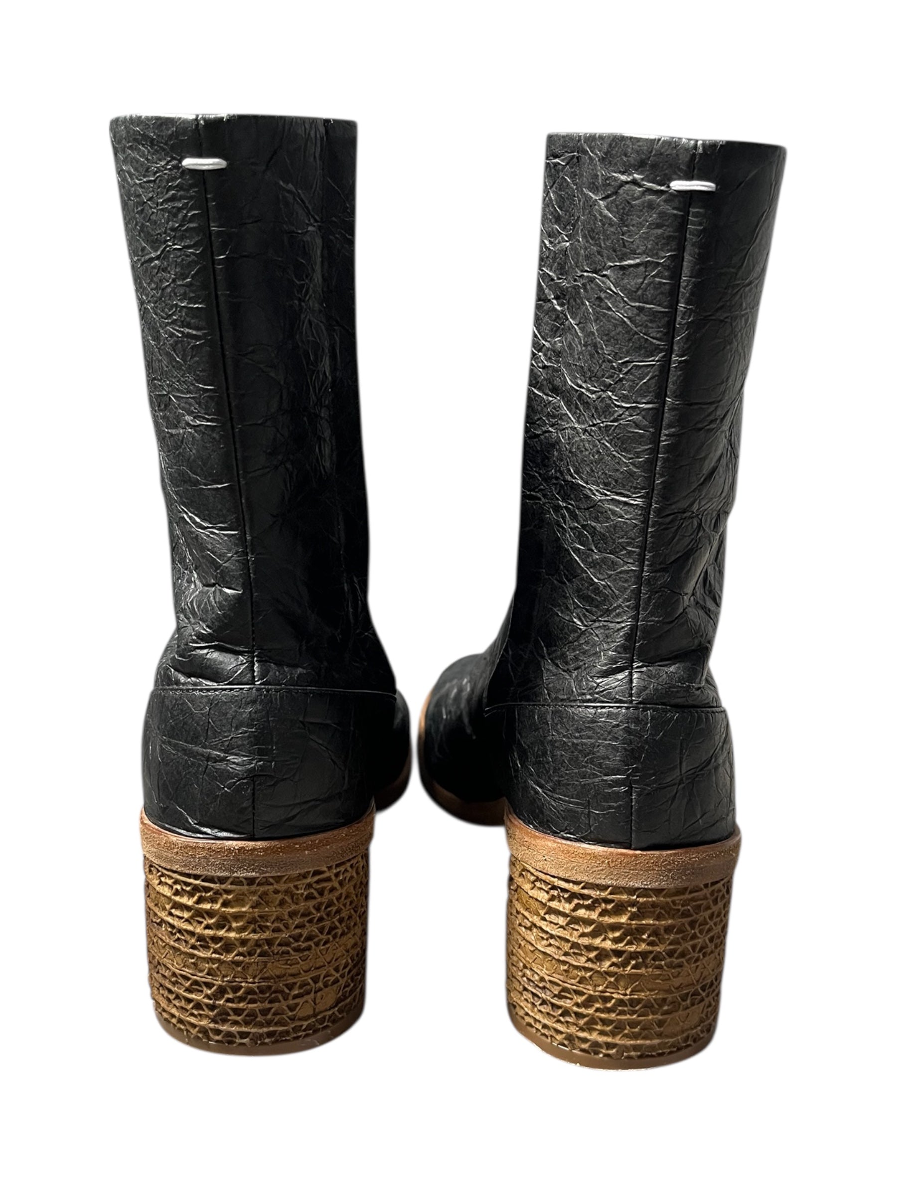 Maison Margiela SS22 crinkled paper effect leather tabi boots, showcasing textured leather and distinctive split-toe design.