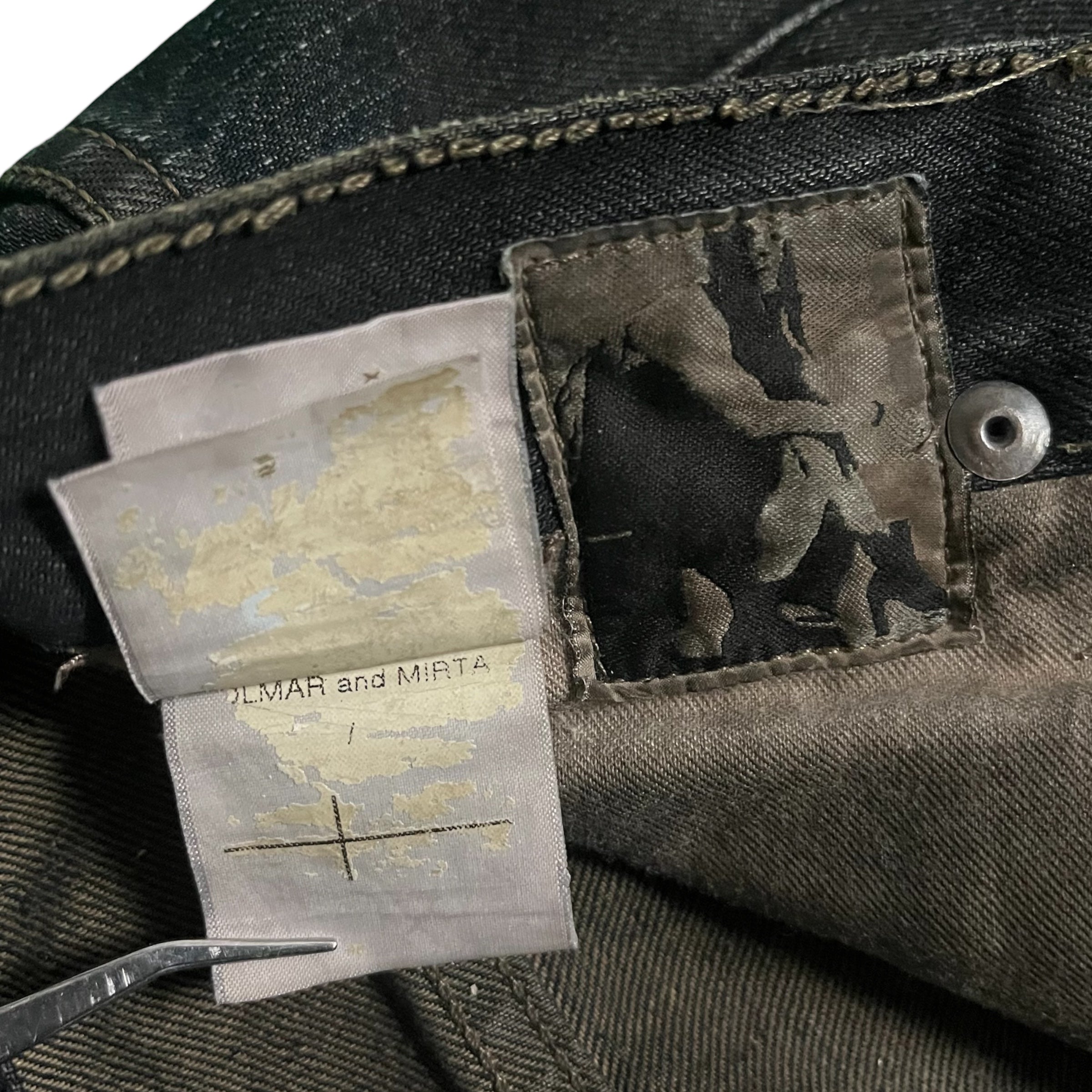 Rick Owens FW08 Stag Clawmark denim pants showing distressed blue denim with unique clawmark details.