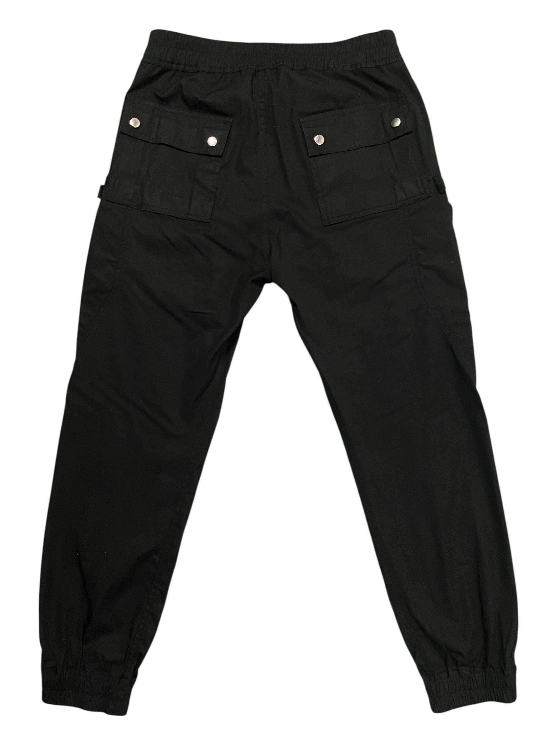 Rick Owens FW23 Luxor Bauhaus Cargo Jogger Pants, black tapered pants with multiple pockets and modern design details.