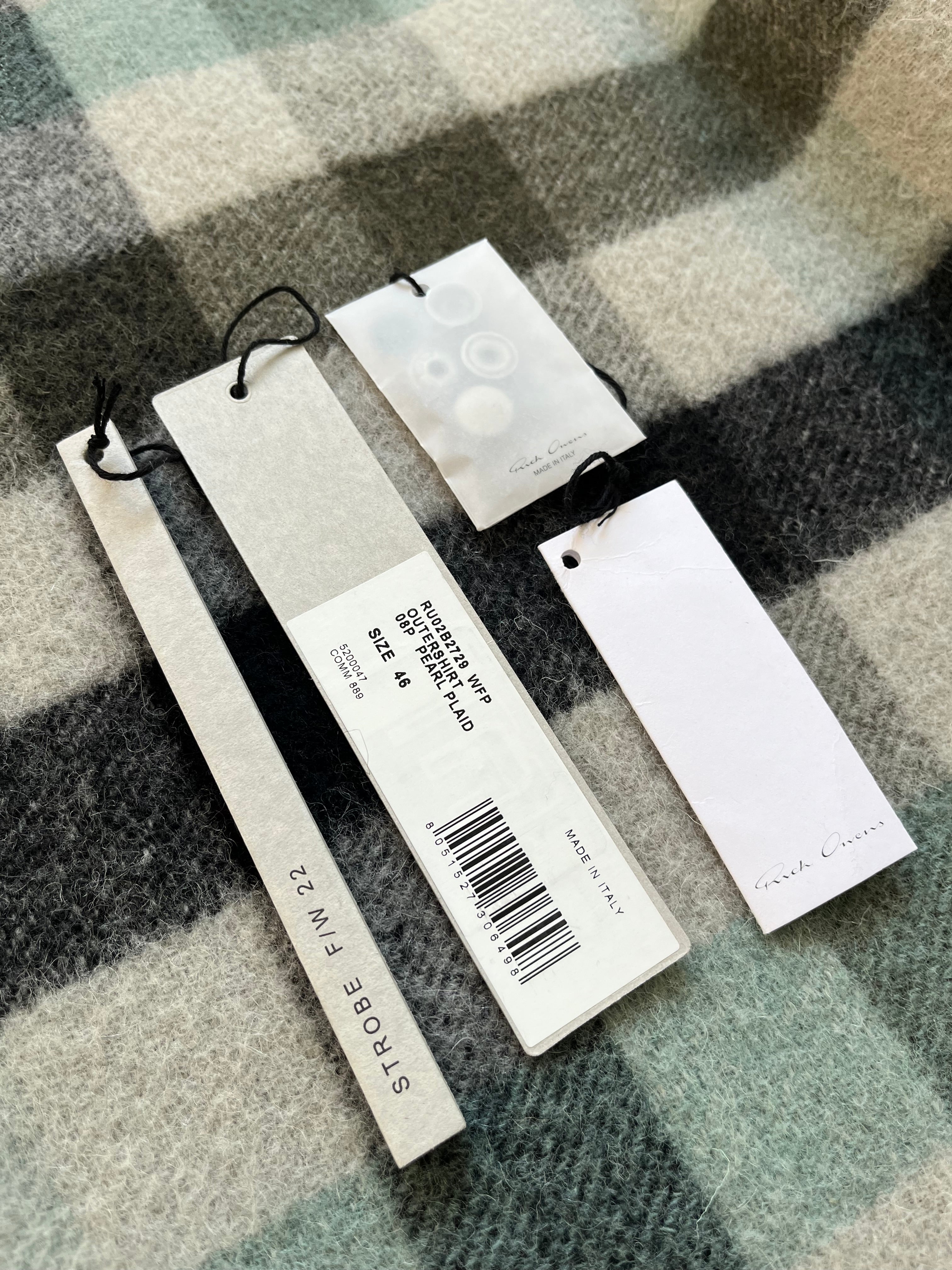 Rick Owens FW22 Strobe Pearl Plaid Alpaca Overshirt jacket with plaid pattern and plush alpaca fabric, shown in a close-up view.
