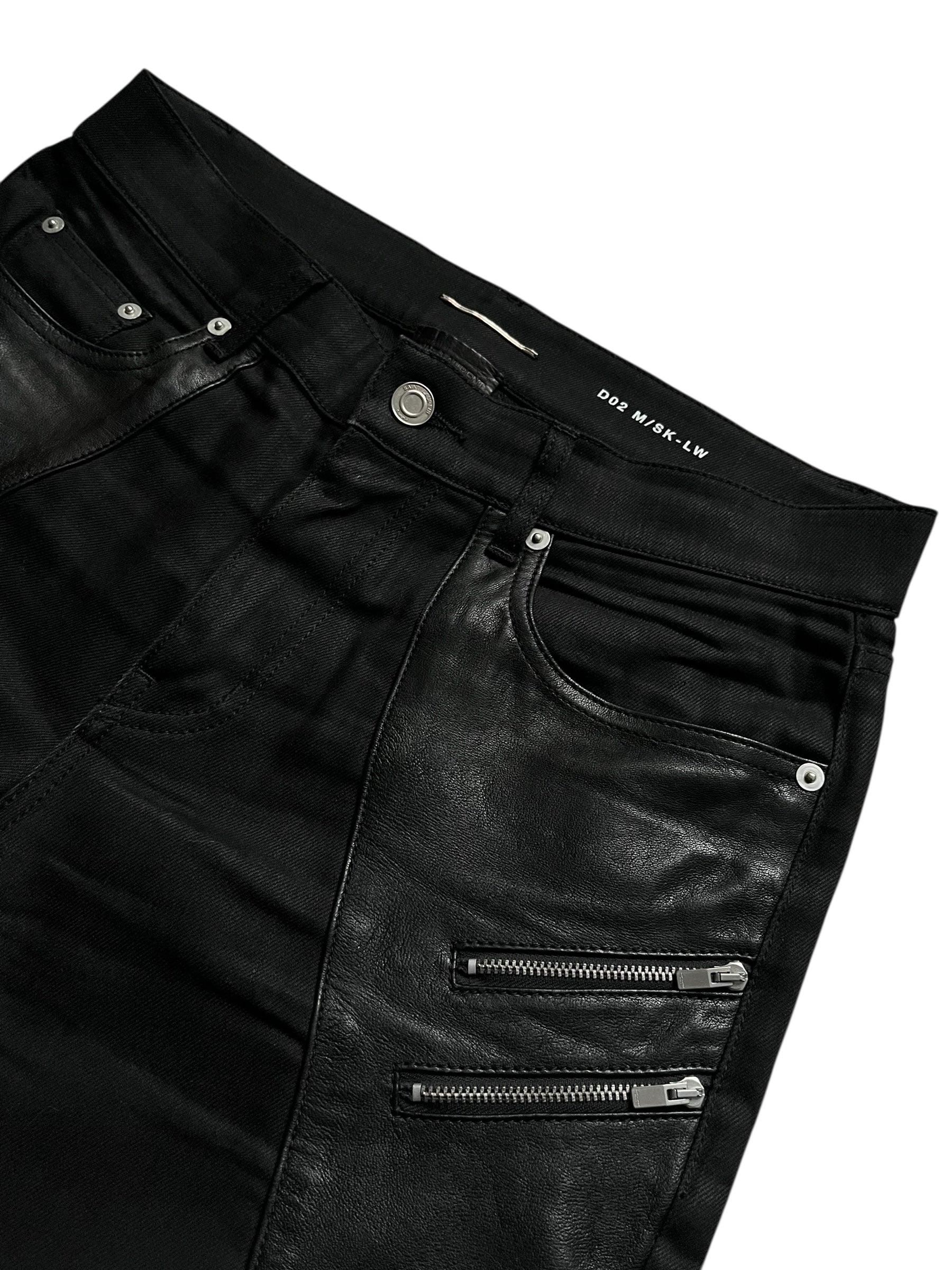 Saint Laurent AW15 Five Zips Biker Denim Pants with multiple zip details and fitted style, displayed on a neutral background.
