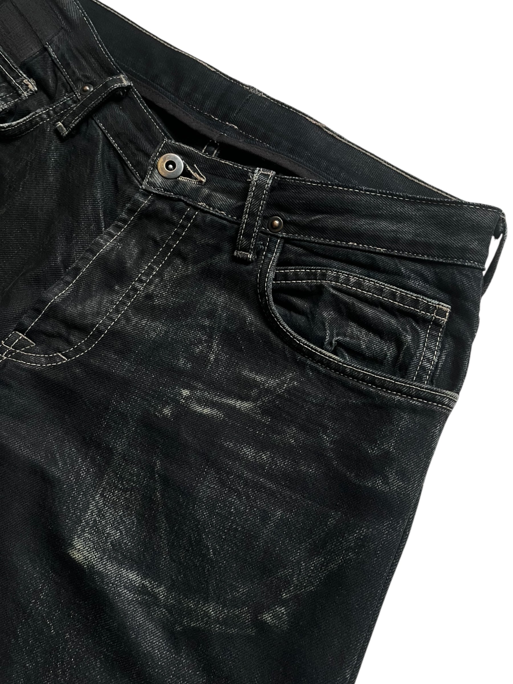 Rick Owens 2006 Slab Black Faded Denim pants with distressed detailing and relaxed fit, shown on a model.