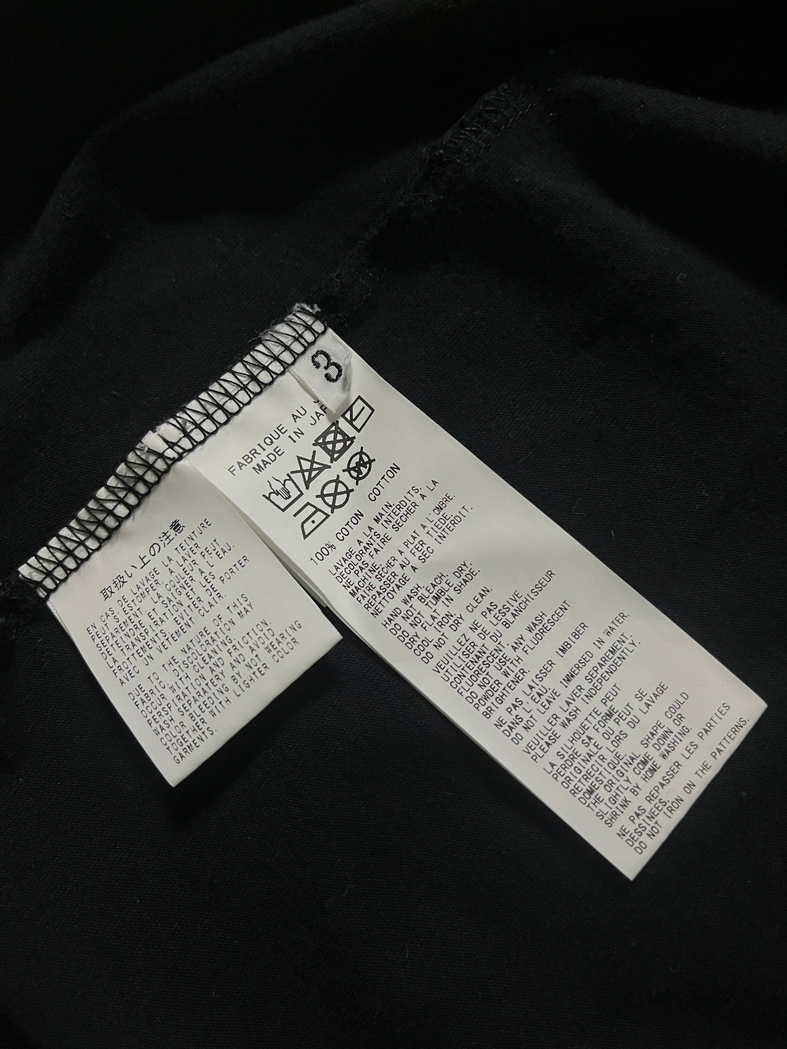 Yohji Yamamoto AW22 signature logo T-shirt in black with front graphic and relaxed fit, casual streetwear style.