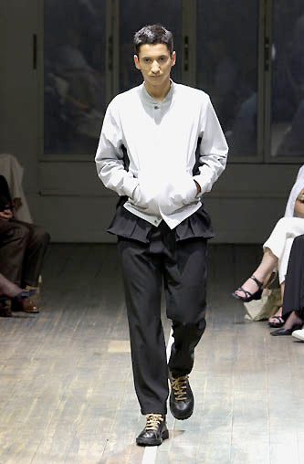 Yohji Yamamoto SS01 runway lambskin jacket shown in black with a sleek, fitted design and stylish collar detail.