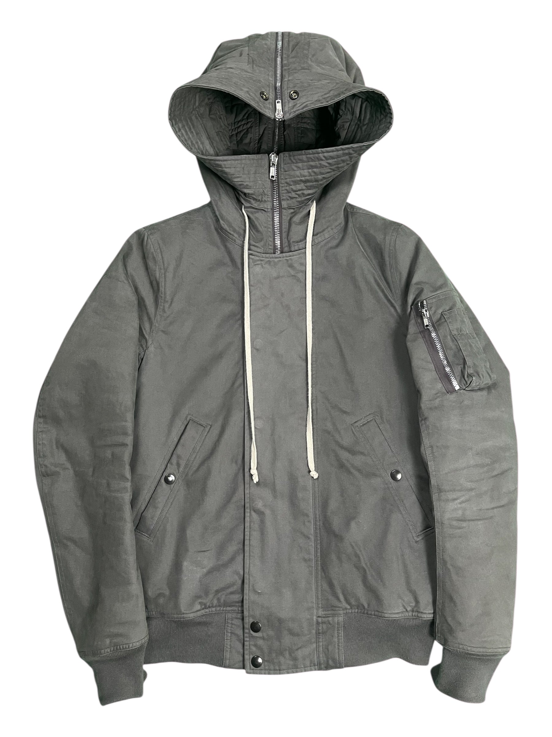 Rick Owens FW16 DRKSHDW Exploder bomber jacket with black fabric, ribbed cuffs, and zip closure, displayed on a hanger.