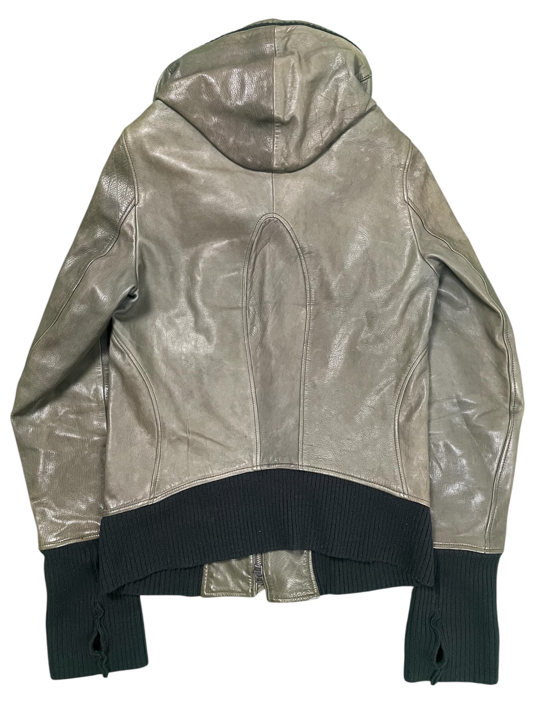 Le Grande Bleu Bono green leather jacket for the 2000s, featuring a stylish design and classic leather texture.