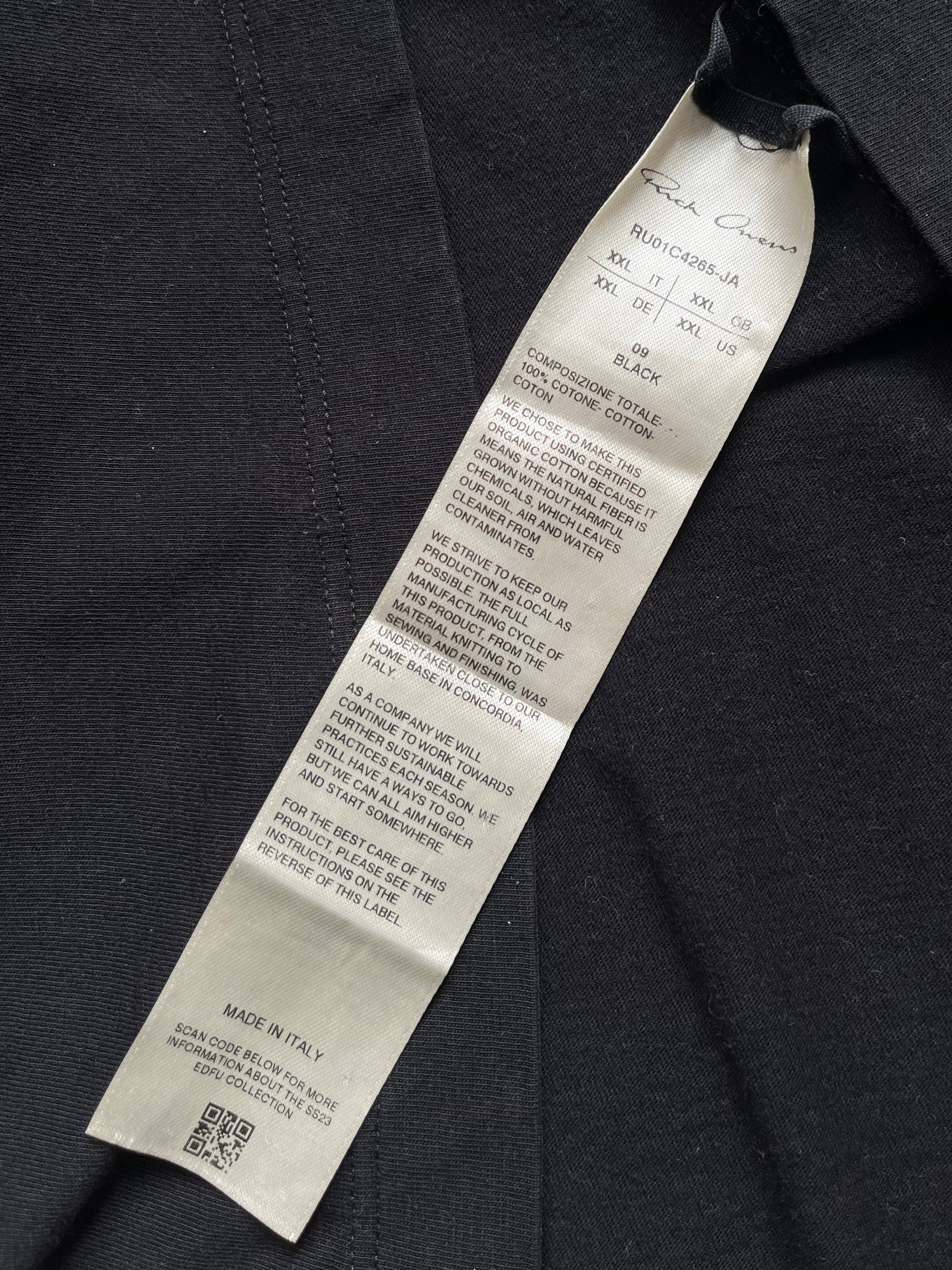 Rick Owens SS23 "EDFU" black Level T-shirt displayed on a hanger with a sleek, minimalist design and soft fabric texture.