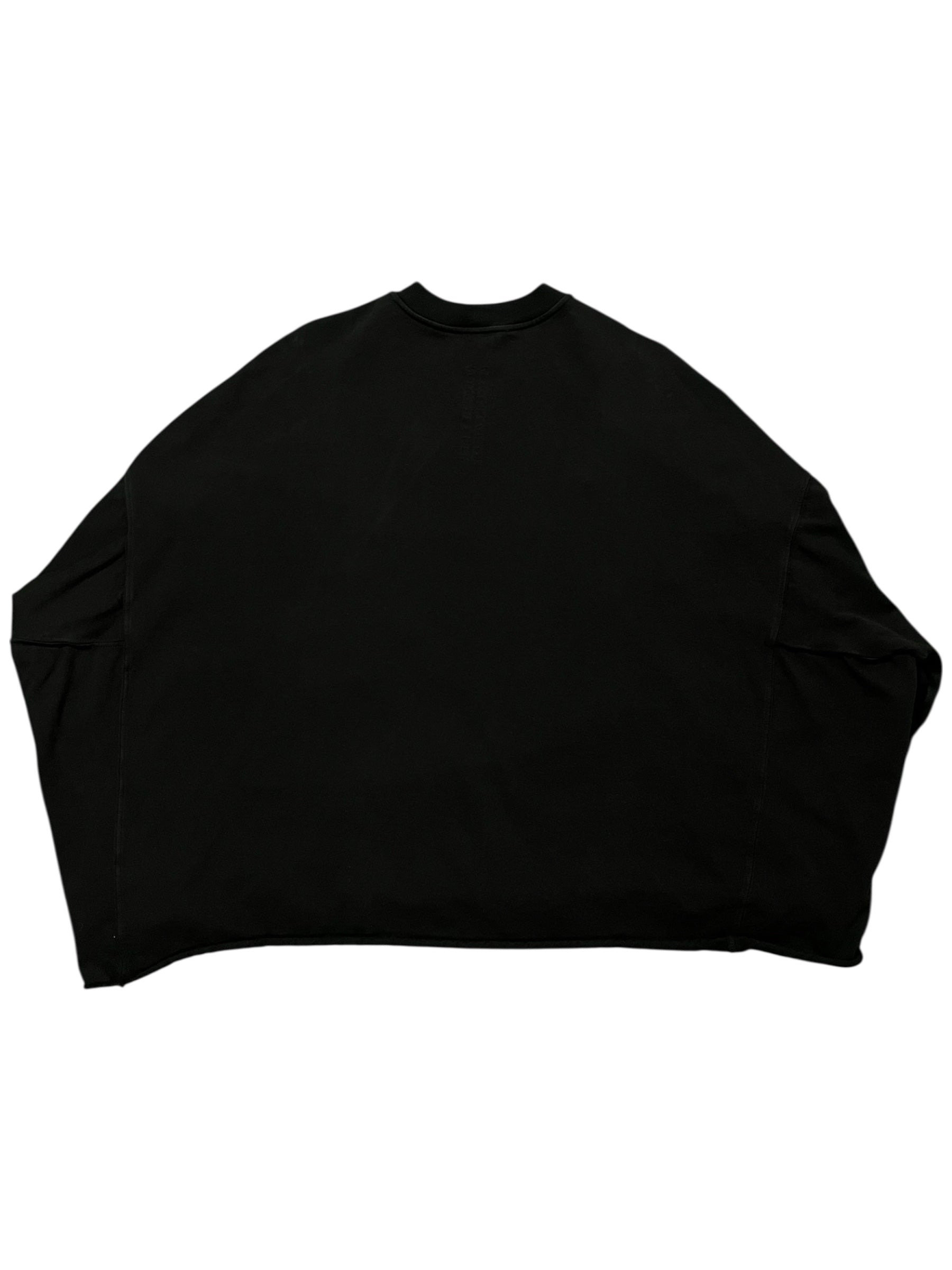 Rick Owens DRKSHDW oversized crewneck in black, close-up showing soft fabric and oversized fit style.
