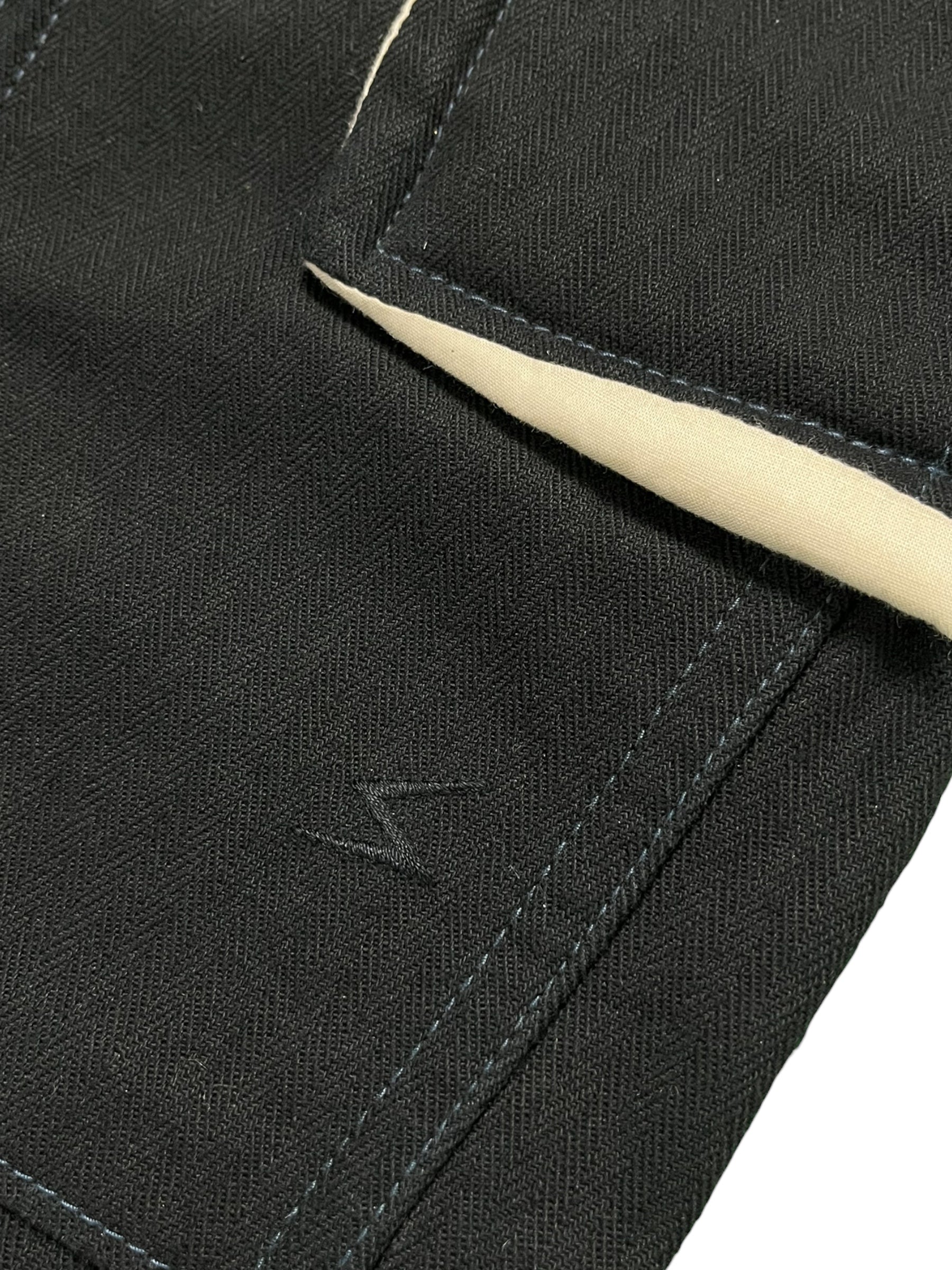 Undercover AW04 "But Beautiful" cargo pants featuring parasitic and stuffed design elements, casual style, and multiple pockets.