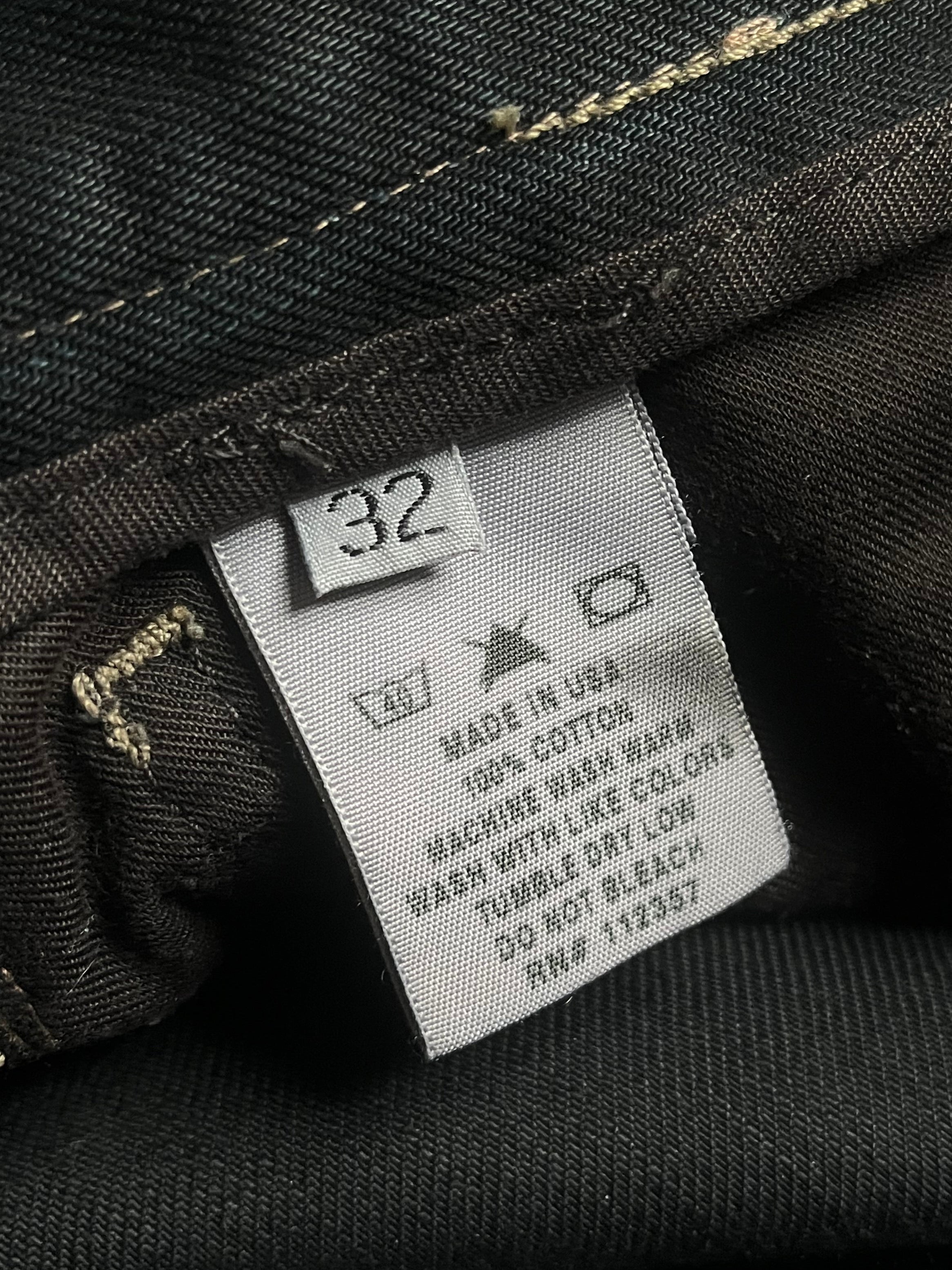 Rick Owens 2006 Slab Black Faded Denim pants showing distressed black denim fabric and relaxed fit design.