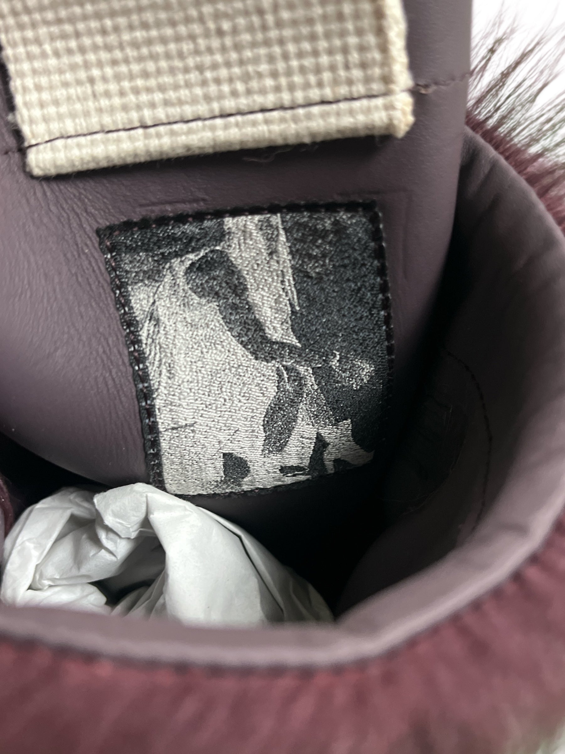Rick Owens FW23 Luxor Amethyst Pony Hair Cargo Geobasket sneakers with high-top design and textured pony hair in purple.