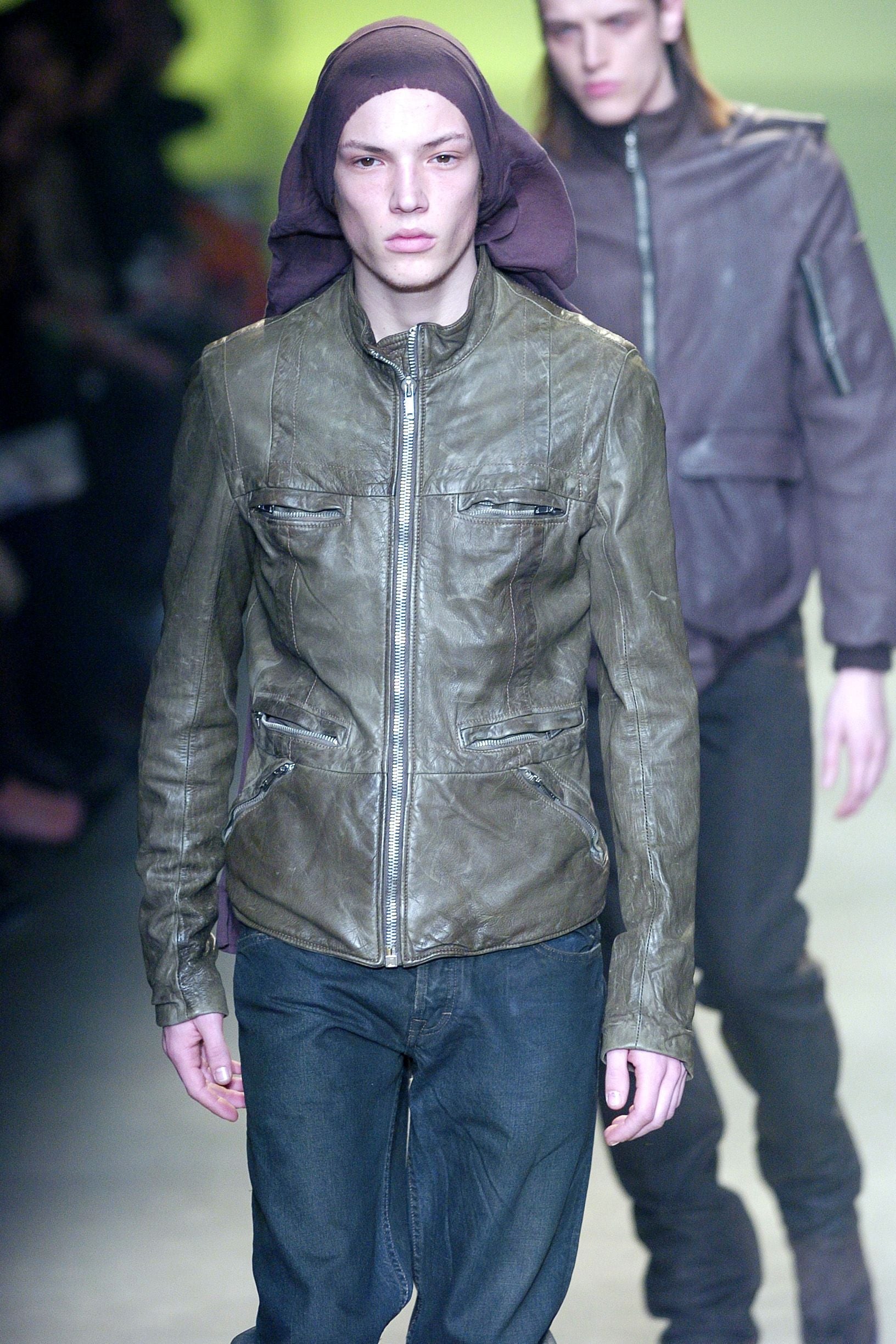 Rick Owens AW04 Queen green lambskin jacket with structured design and sleek fit, displayed on a hanger.