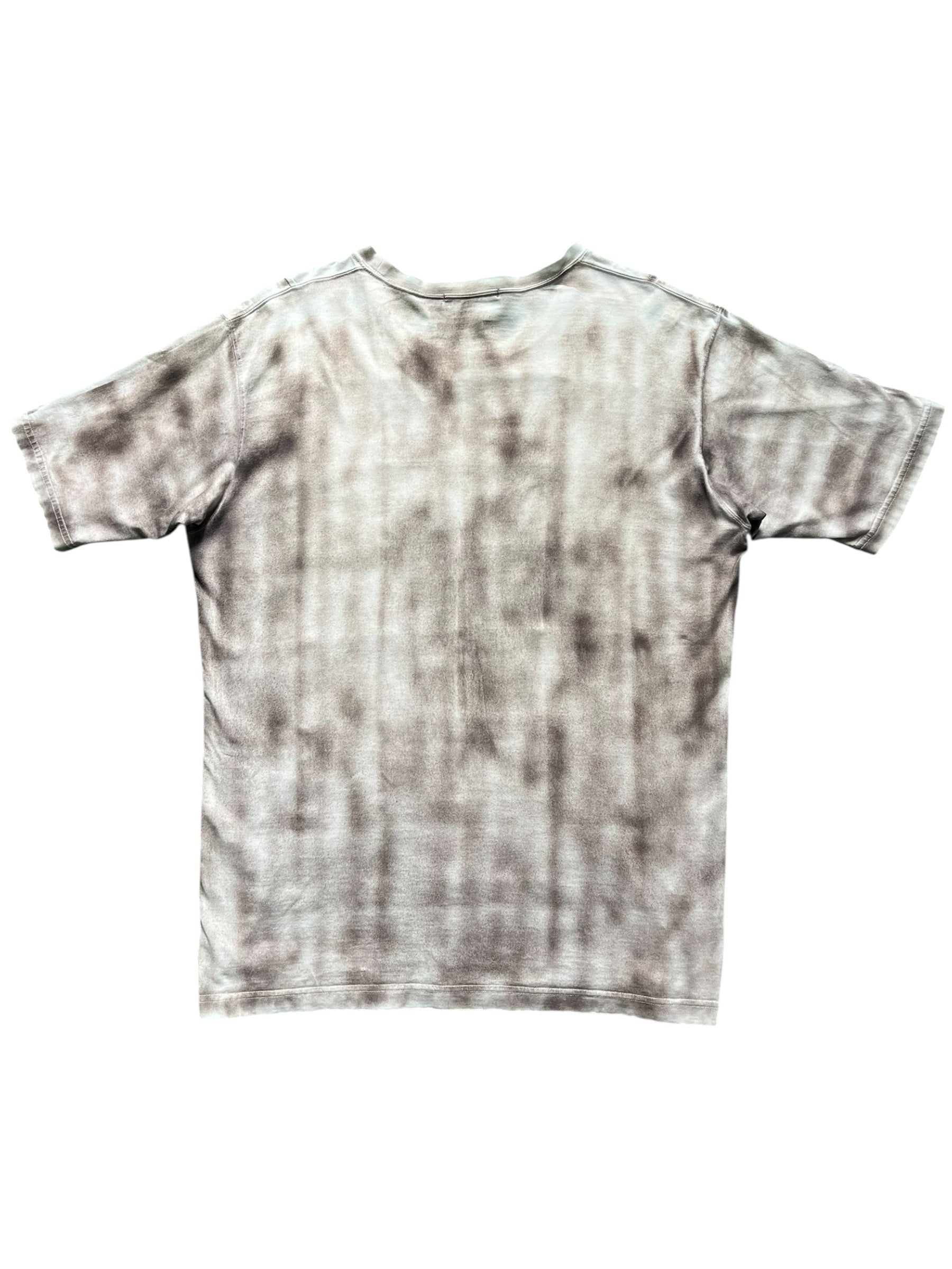 Issey Miyake SS06 quilted effect trompe-l'œil T-shirt with layered design and textured fabric in a close-up view.