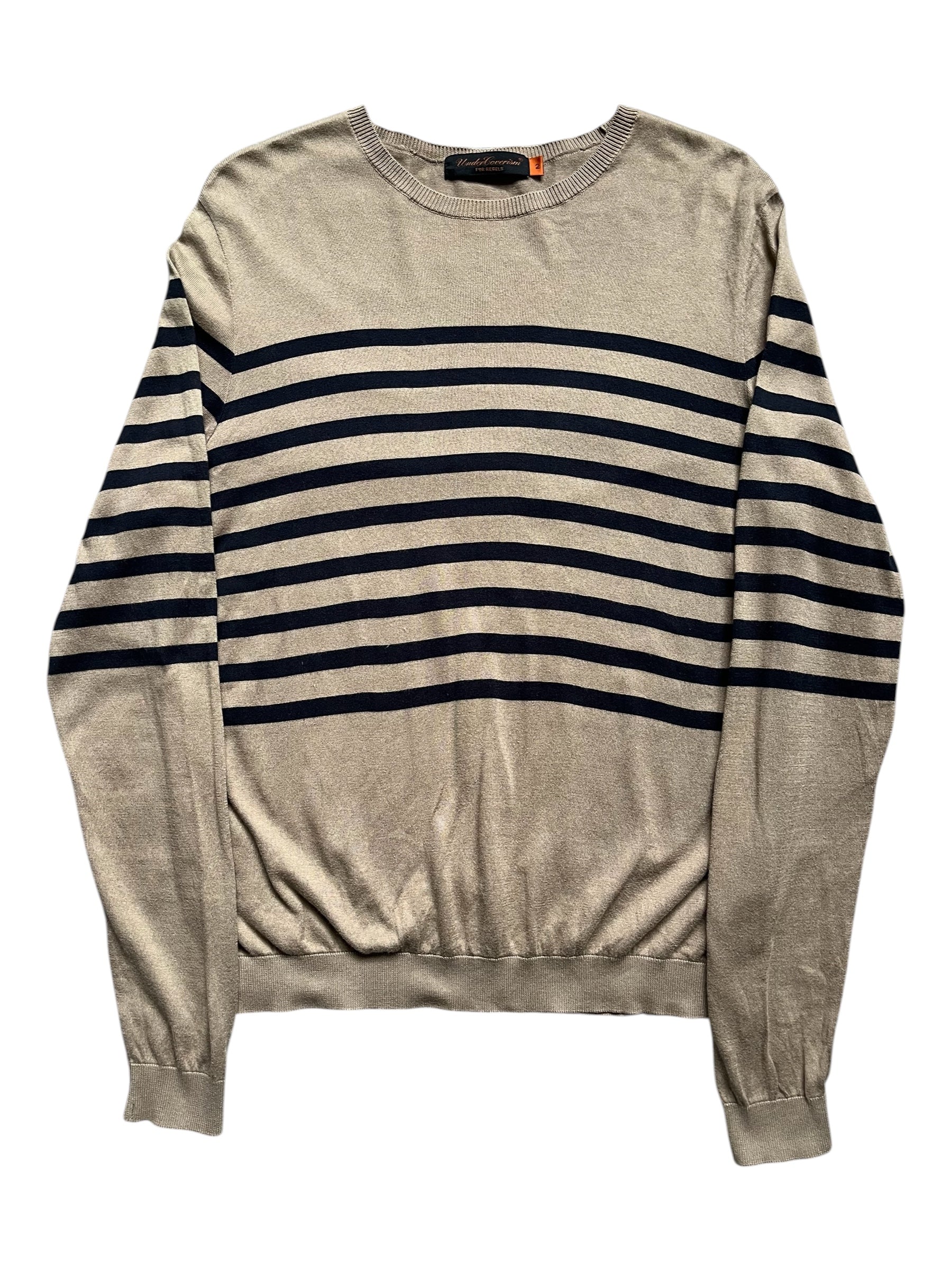 Undercover SS07 Purple Striped Knit, showcasing soft knit fabric with bold purple and white stripes.