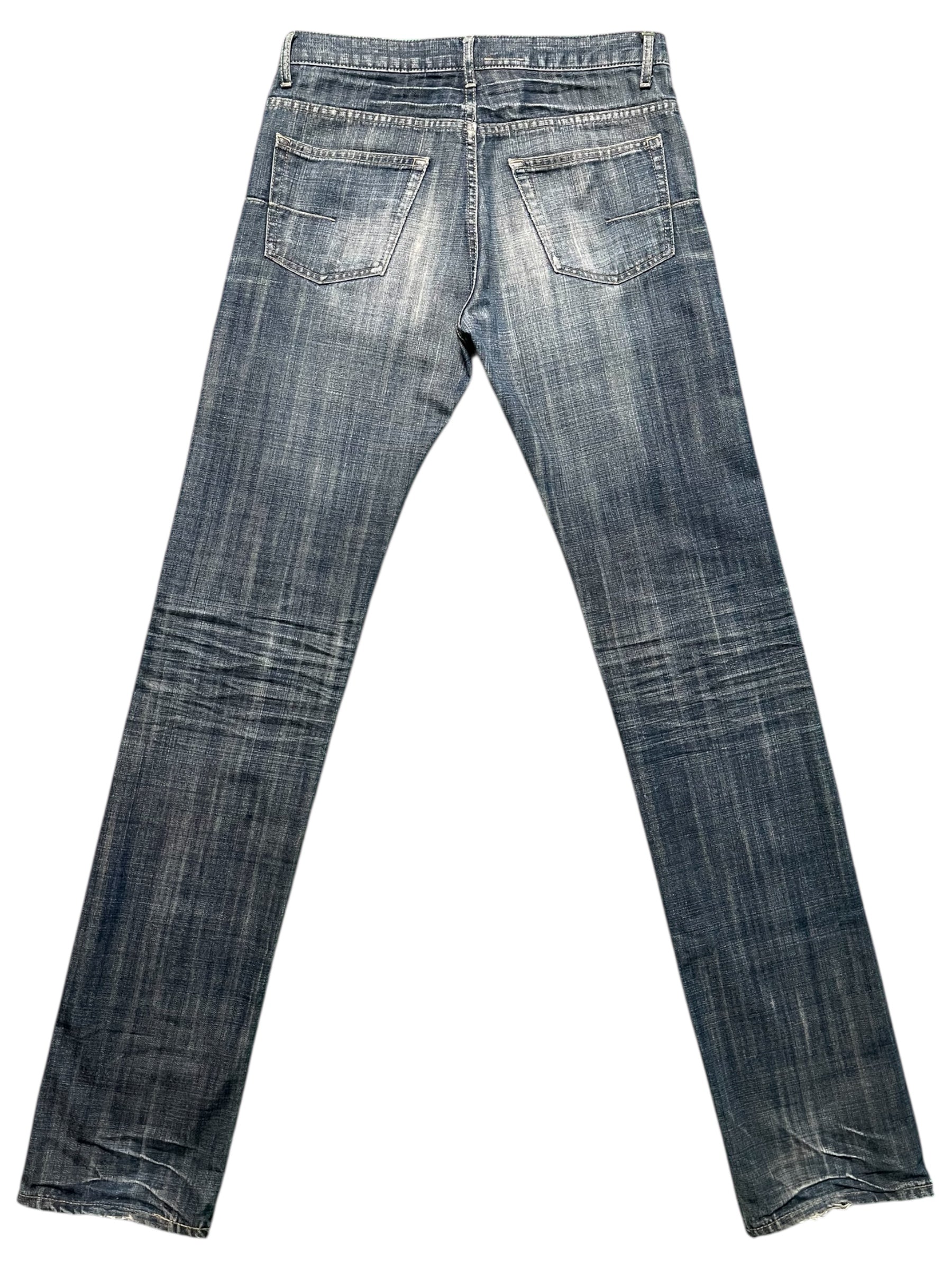 Dior SS05 “BECK” blue glitter denim pants with a slim fit and stylish design, showcased on a model.