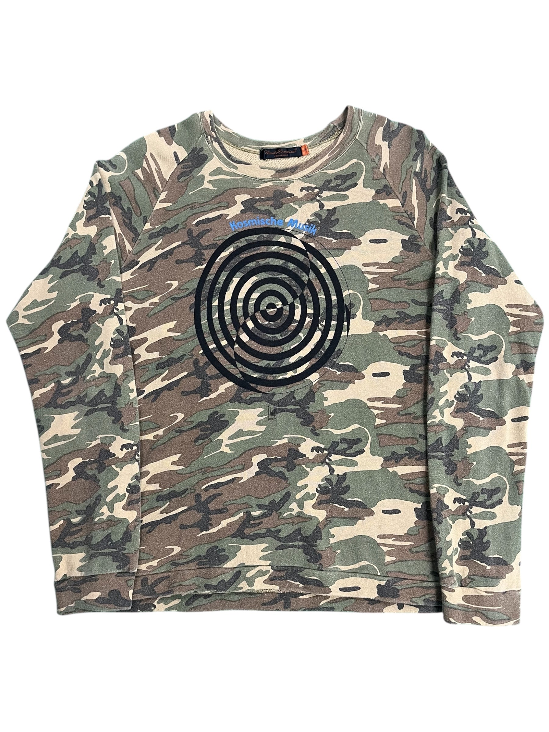 Undercover SS06 “T” Klaus camo long sleeve T-shirt with graphic print, casual fit, and comfortable fabric.