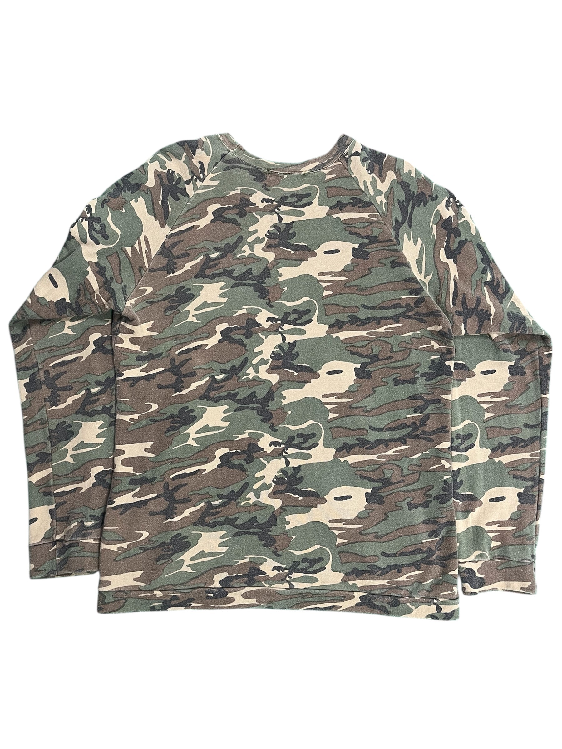 Undercover SS06 Klaus Camo long sleeve T-shirt with "T" logo, featuring camouflage pattern and comfortable fit.