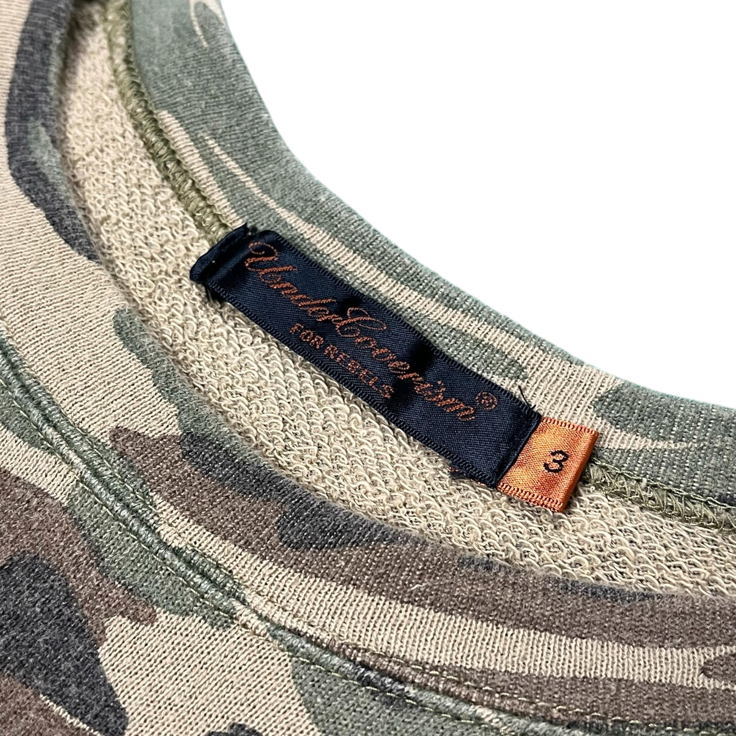 Undercover SS06 “T” Klaus Camo long sleeve T-shirt with camouflage pattern, featuring a casual fit and stylish design.