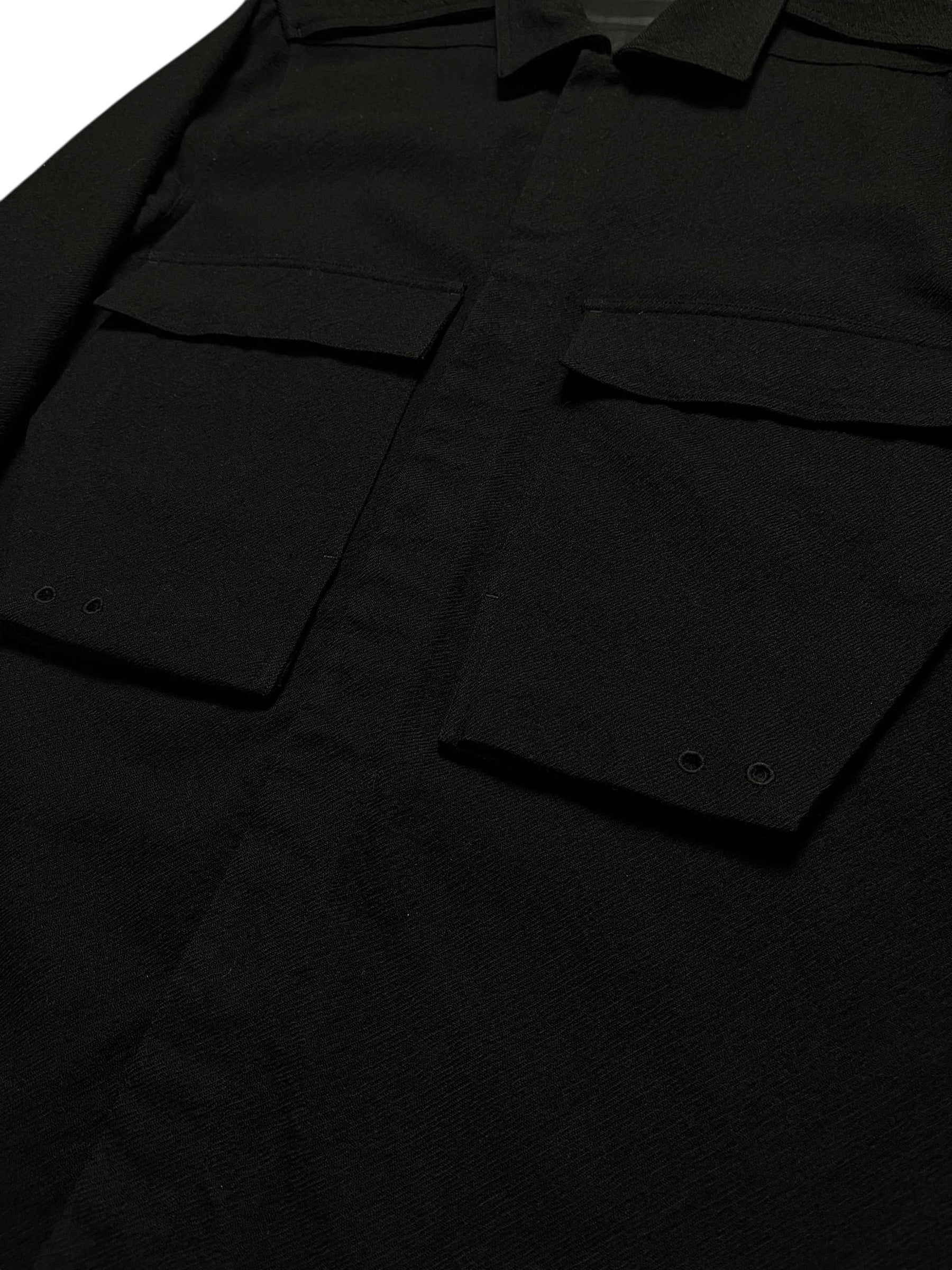 Rick Owens FW16 Mastodon wool gabardine overshirt displayed on a hanger, showcasing its textured fabric and oversized fit.