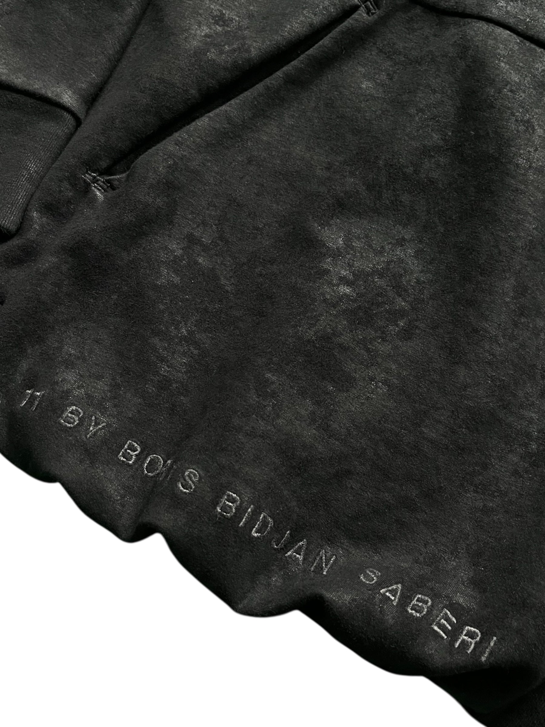 Black Boris Bidjan Saberi Ninja Hoodie with detailed stitching and unique design, displayed on a mannequin.