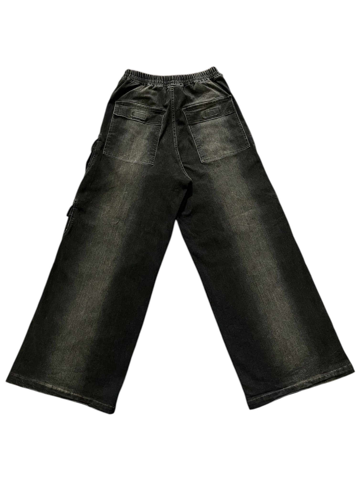 Rick Owens DRKSHDW Bella Double Cargo Denim pants with multiple pockets and distressed details, shown in dark blue denim fabric.