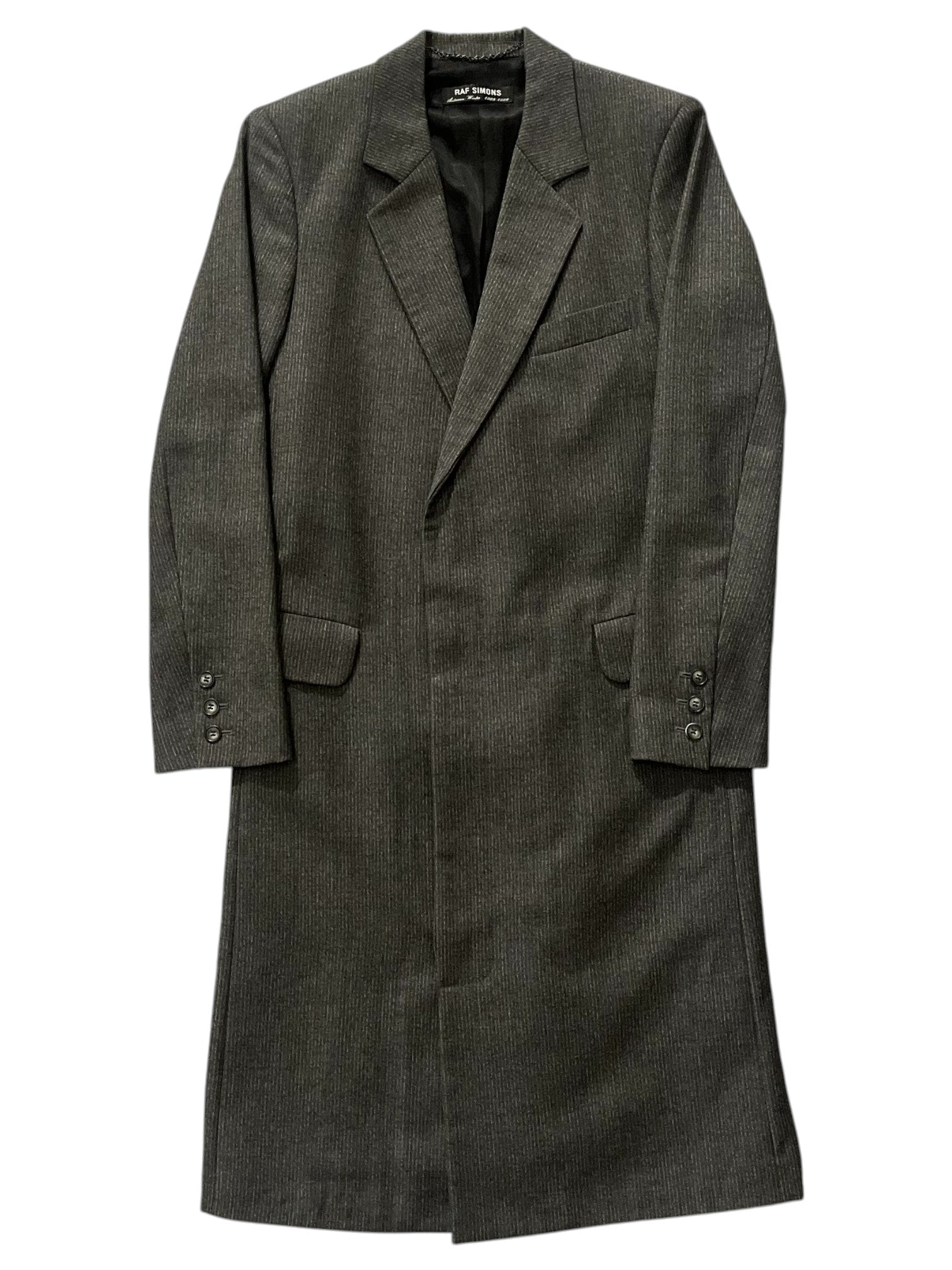 Raf Simons AW98-99 "Radioactivity" cashmere trench coat, stylish jacket with detailed design and luxurious fabric, shown in the image.